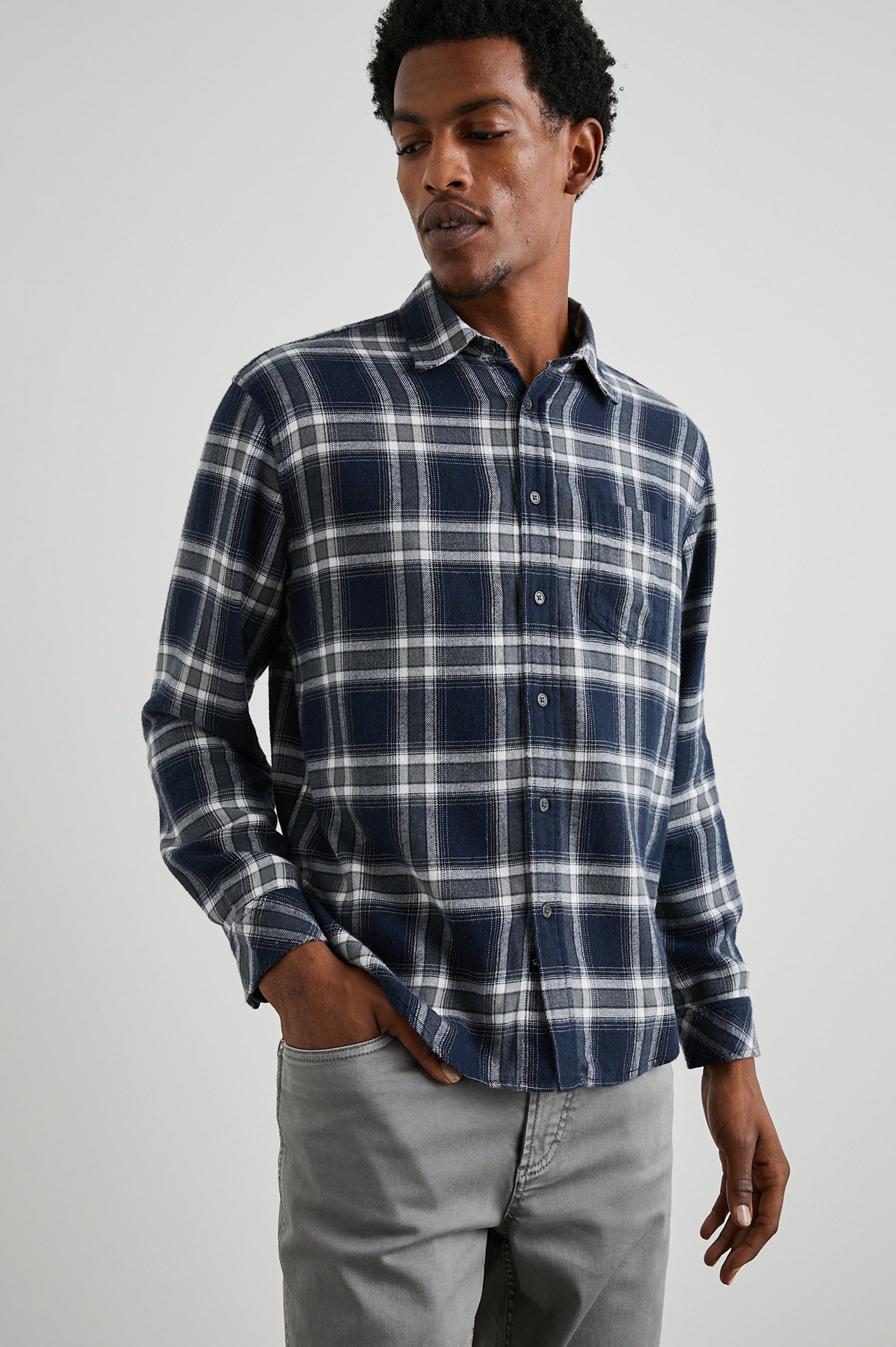Lennox Long-Sleeve Button Up with a Chest Patch Pocket in Navy Cove Colorway, a plaid in White, Grey and Blue- Front View Featured on Model
