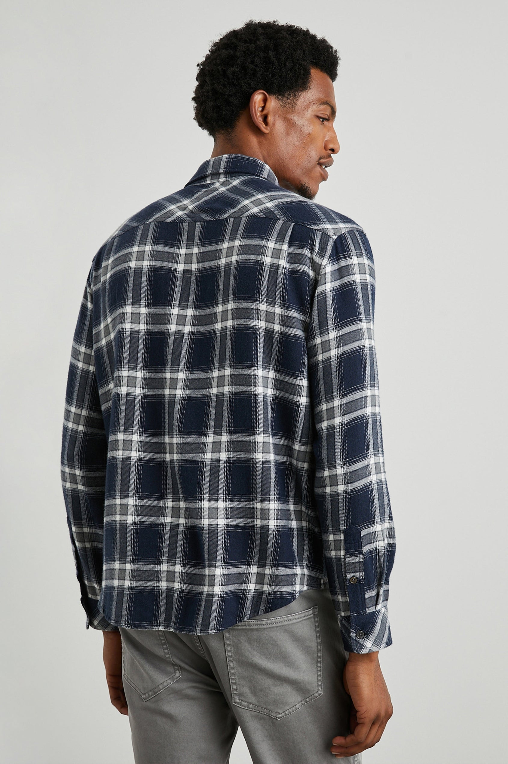 Lennox Long-Sleeve Button Up with a Chest Patch Pocket in Navy Cove Colorway, a plaid in White, Grey and Blue- Back View Featured on Model