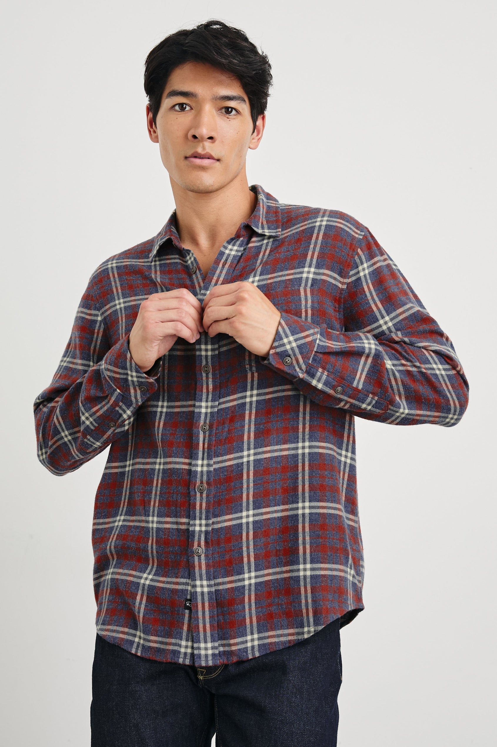 Lennox Long-Sleeve Button Up with a Chest Patch Pocket in Navy Red Cream Colorway, a plaid - Front View Featured on Model