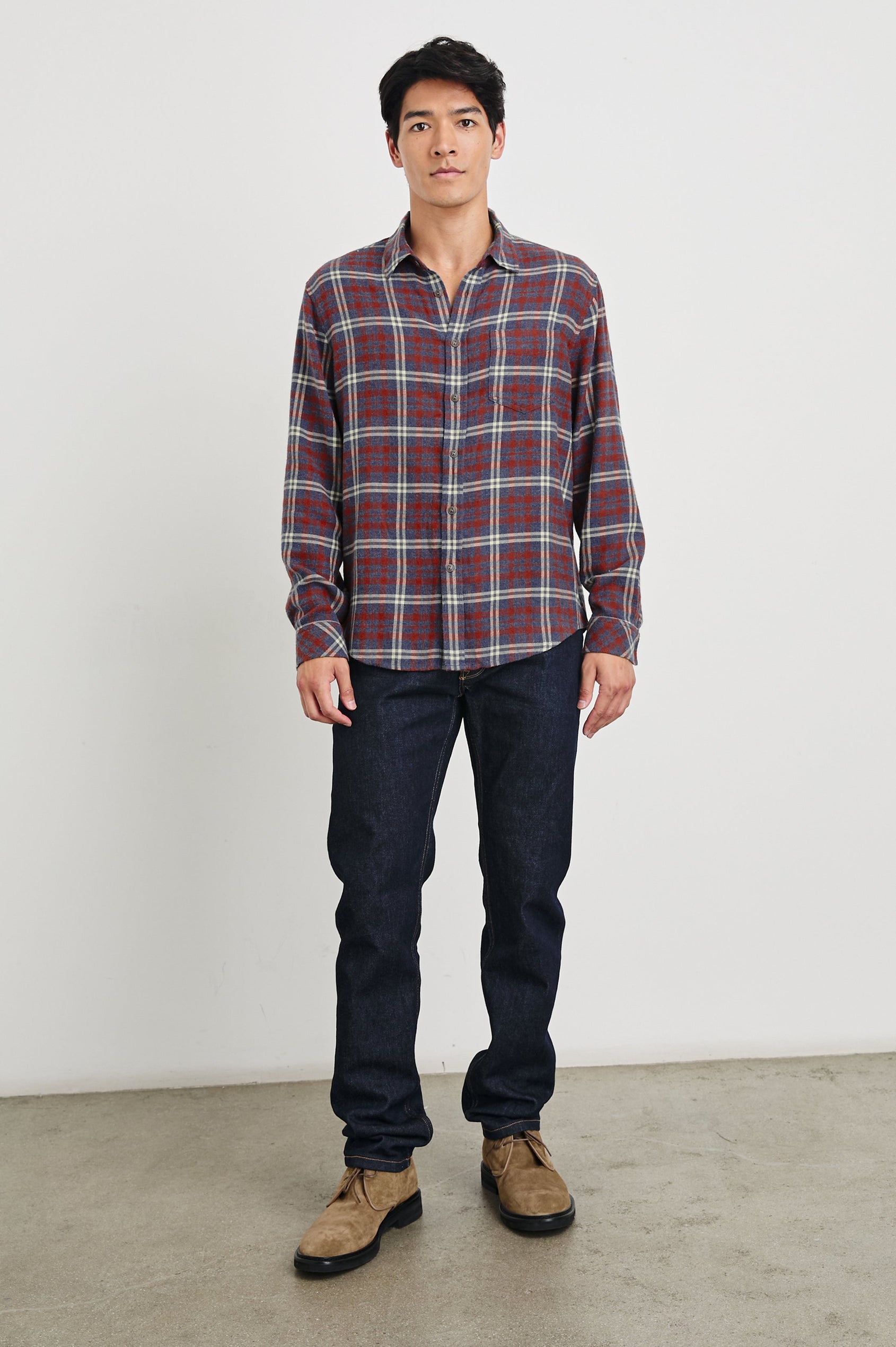 Lennox Long-Sleeve Button Up with a Chest Patch Pocket in Navy Red Cream Colorway, a plaid - Front Full Body View Featured on Model