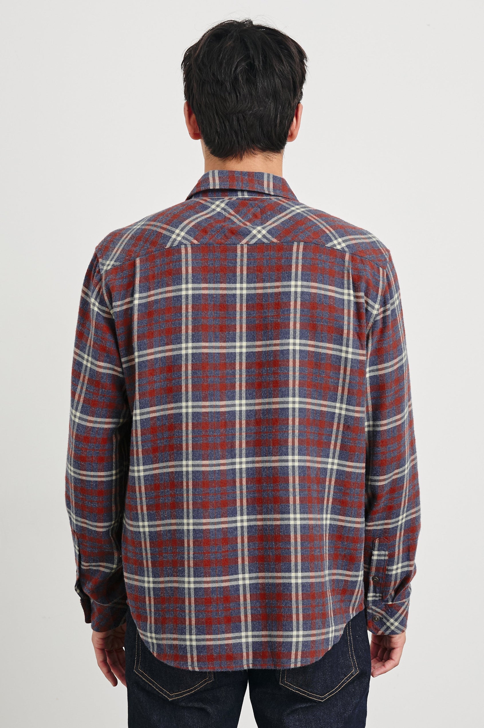 Lennox Long-Sleeve Button Up with a Chest Patch Pocket in Navy Red Cream Colorway, a plaid - Back View Featured on Model