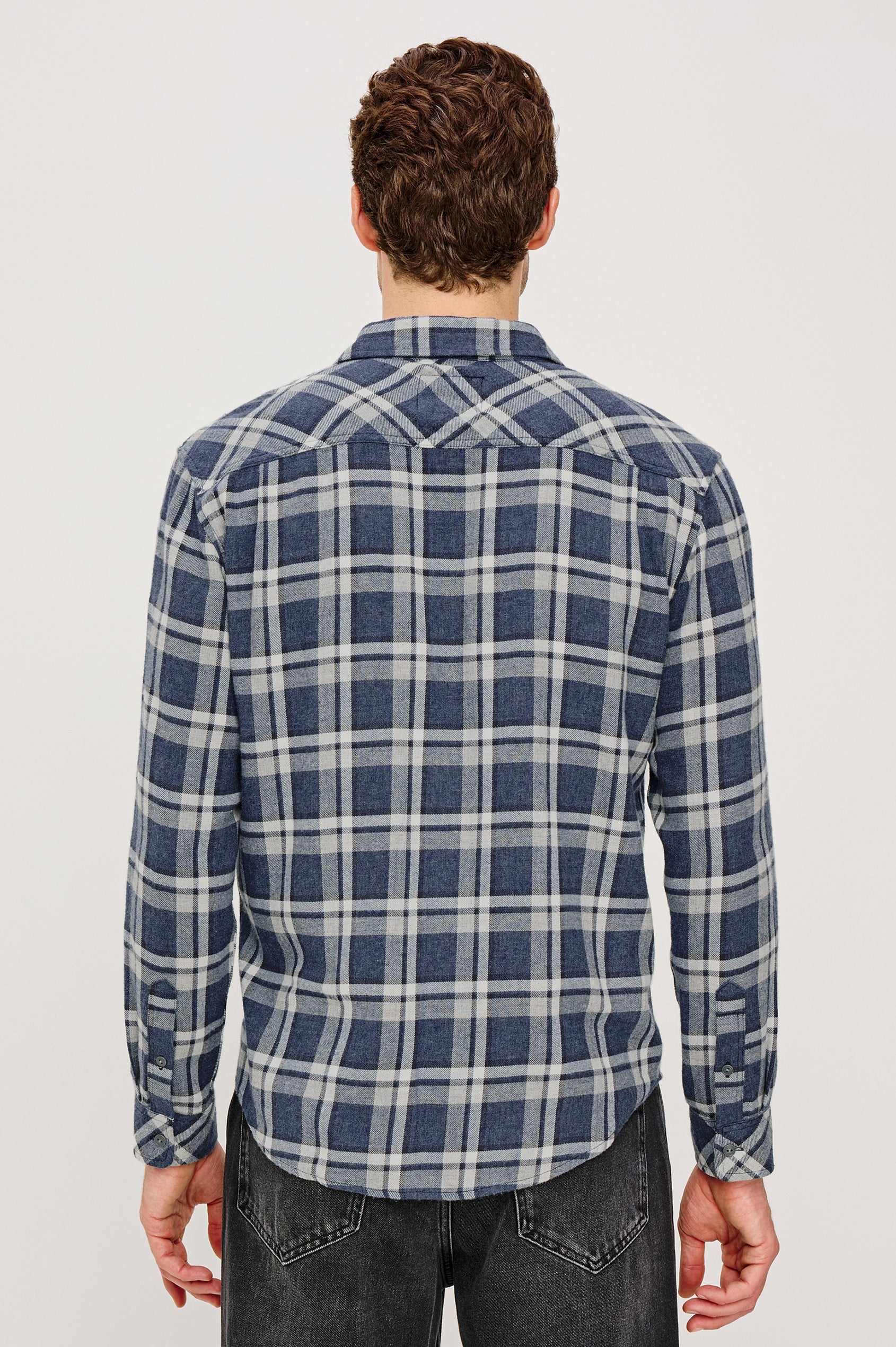 Lennox Long-Sleeve Button Up with a Chest Patch Pocket in Nocturen Shimmer Colorway. Back Seated View Featured on model.