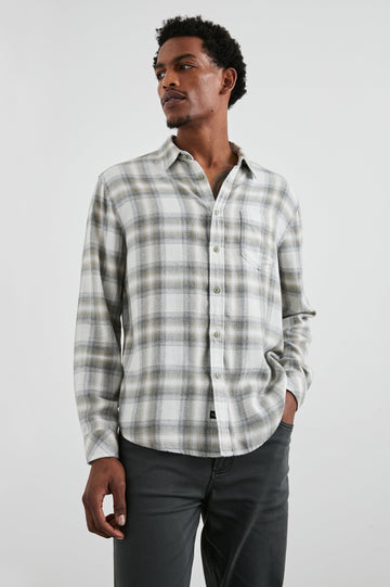 Lennox Long-Sleeve Button Up with a Chest Patch Pocket in Quicksand Spark Melange Colorway, a plaid in Grey, White and Tan - Front View Featured on Model