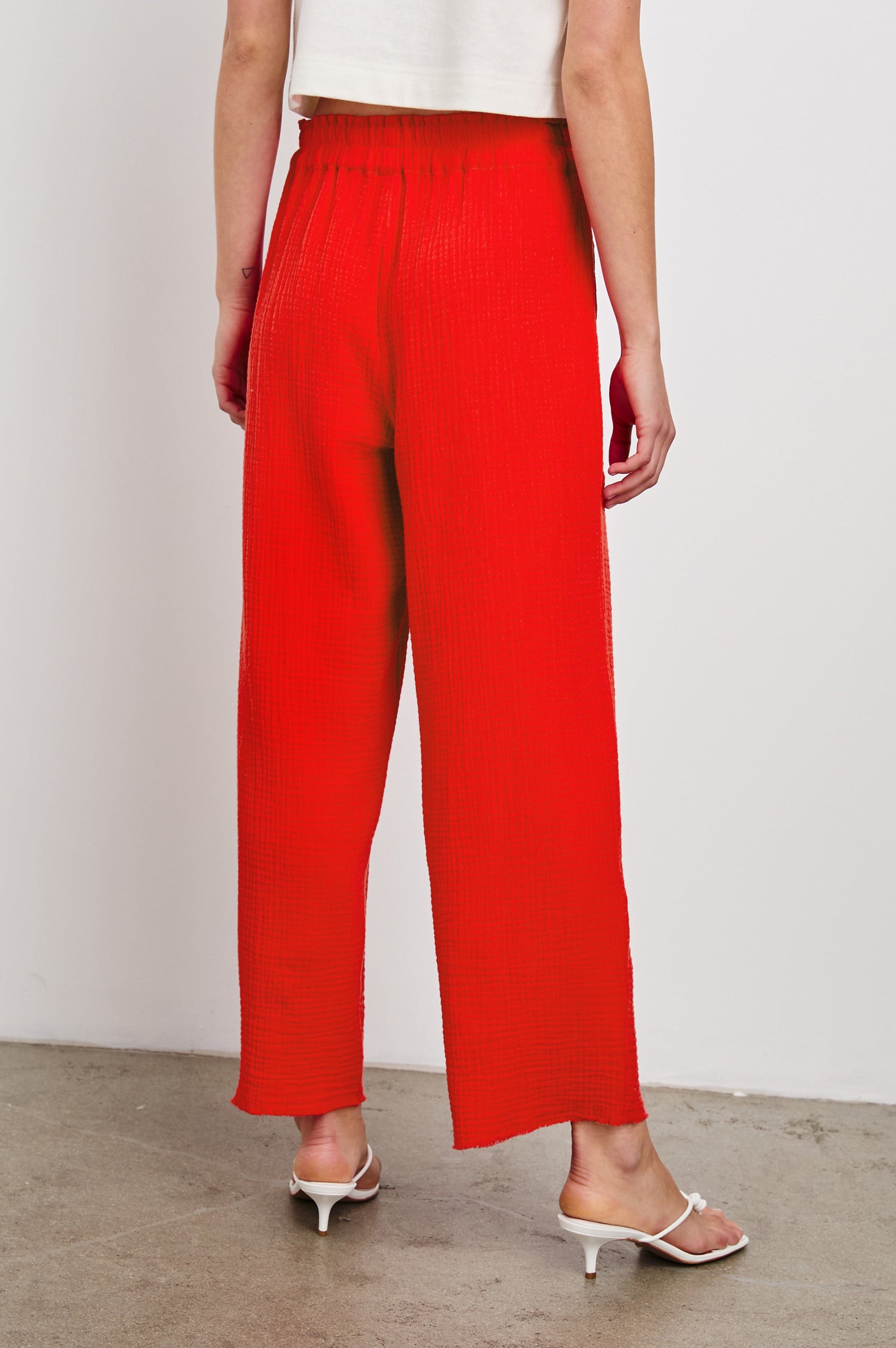 Leon Crop Pant with a Smocked Waistband and Two Front Seam Pockets in Cherry Colorway - Back View Featured on Model