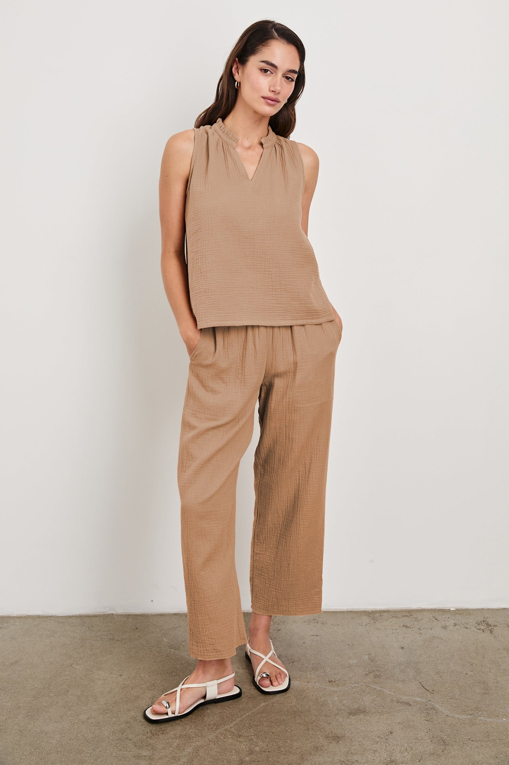 Leon Crop Cotton Gauze Pant With Hemline Slit And Elastic Waist In Colorway Taupe - Full Front Body View Featured On Model