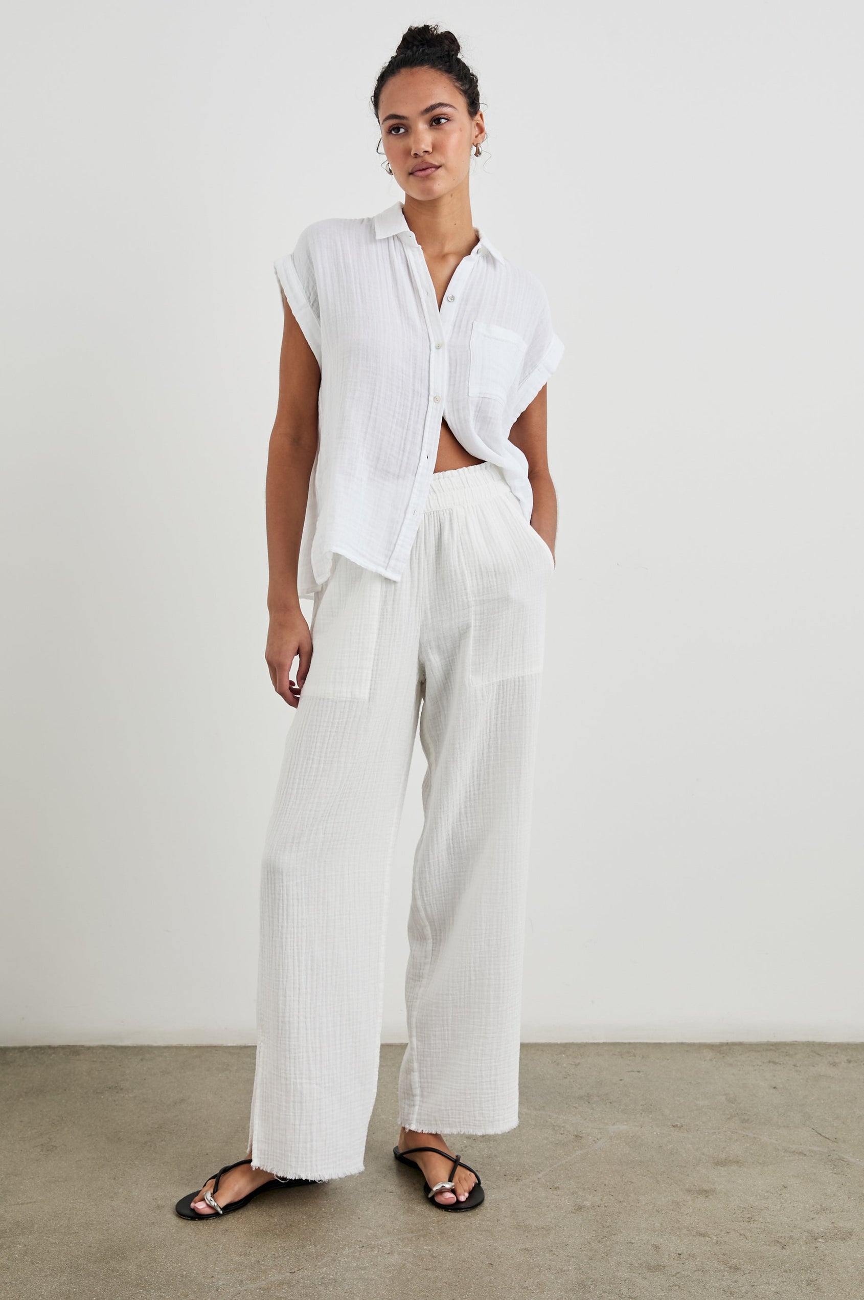 Leon Cotton Gauze Pant With Hemline Slit And Elastic Waist In Colorway White - full body front view on model