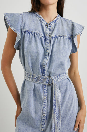 Letta Above-Knee Dress with Flutter Sleeves, Snaps down the Front, and a Belted Waist in Faded Indigo Colorway - Front View Featured on Model 