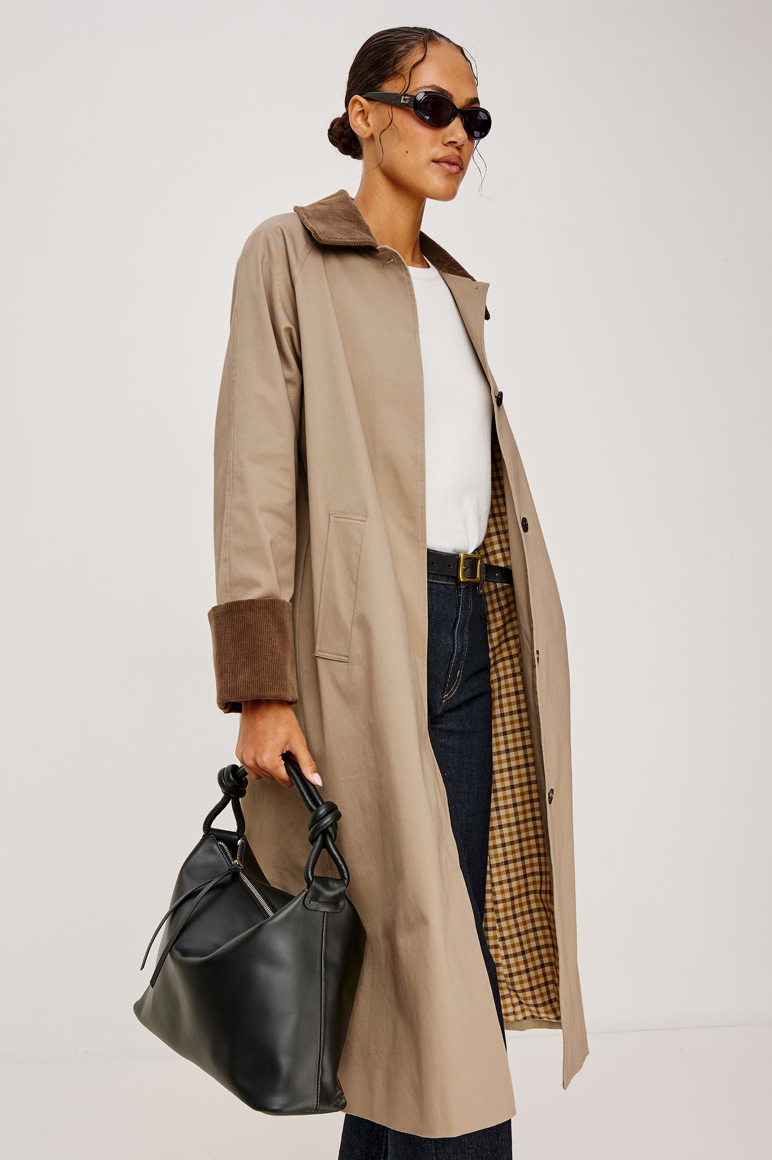 Levy Longline Coat in Twill With Dropped Shoulders, Contrast Corduroy Collar and Long Sleeves With Rolled Cuffs, Hidden Front Placket, Side Pockets, Plaid Lining, and Back Vent Slit in Raisin Colorway - Full Body Front View Featured on Model