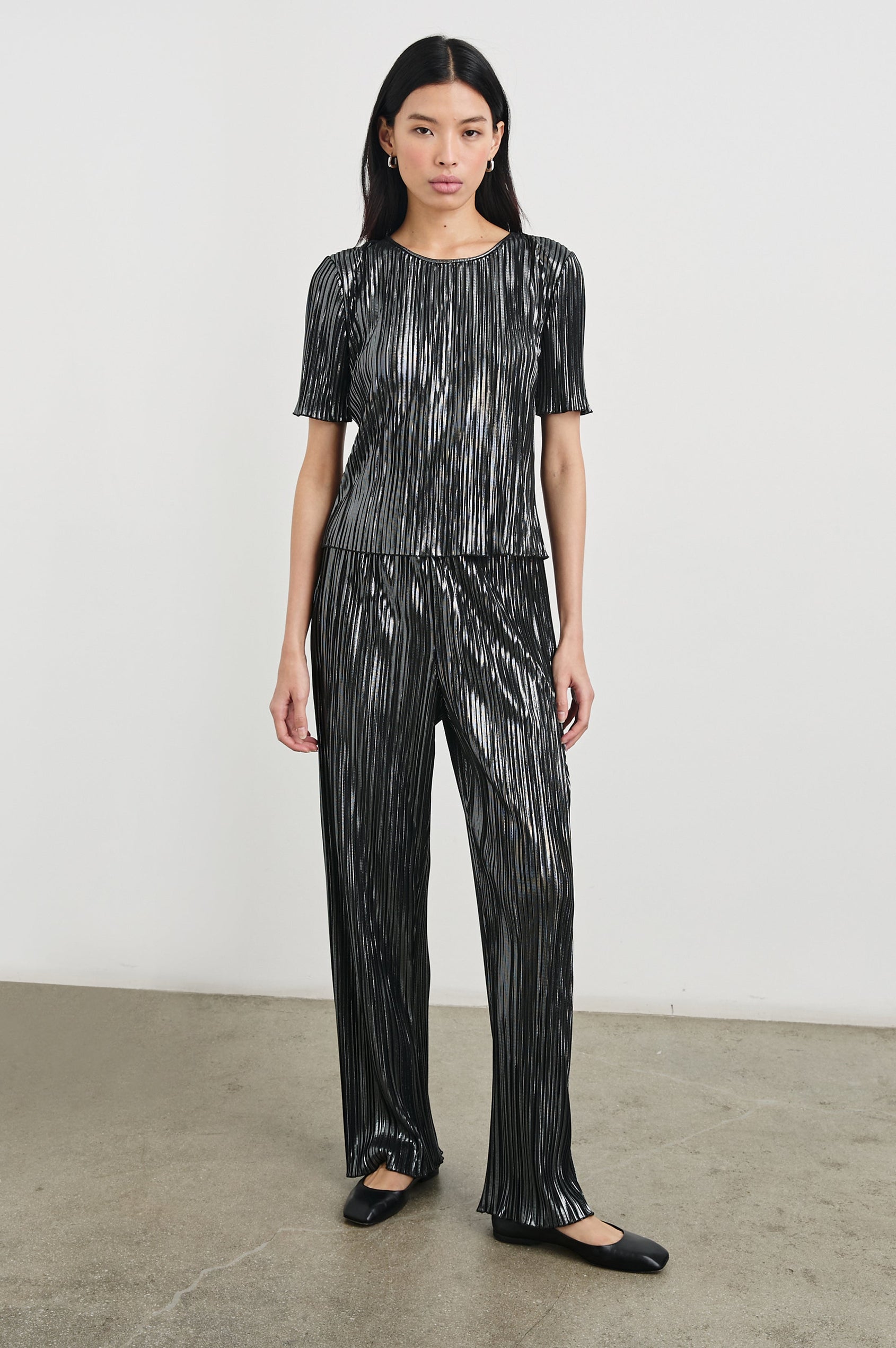 Liana Micro-Pleated Pants with an Elastic Waist in Gunmetal Colorway, Thin black, white and grey Vertical Stripes - Front Full Body View Featured on Model 