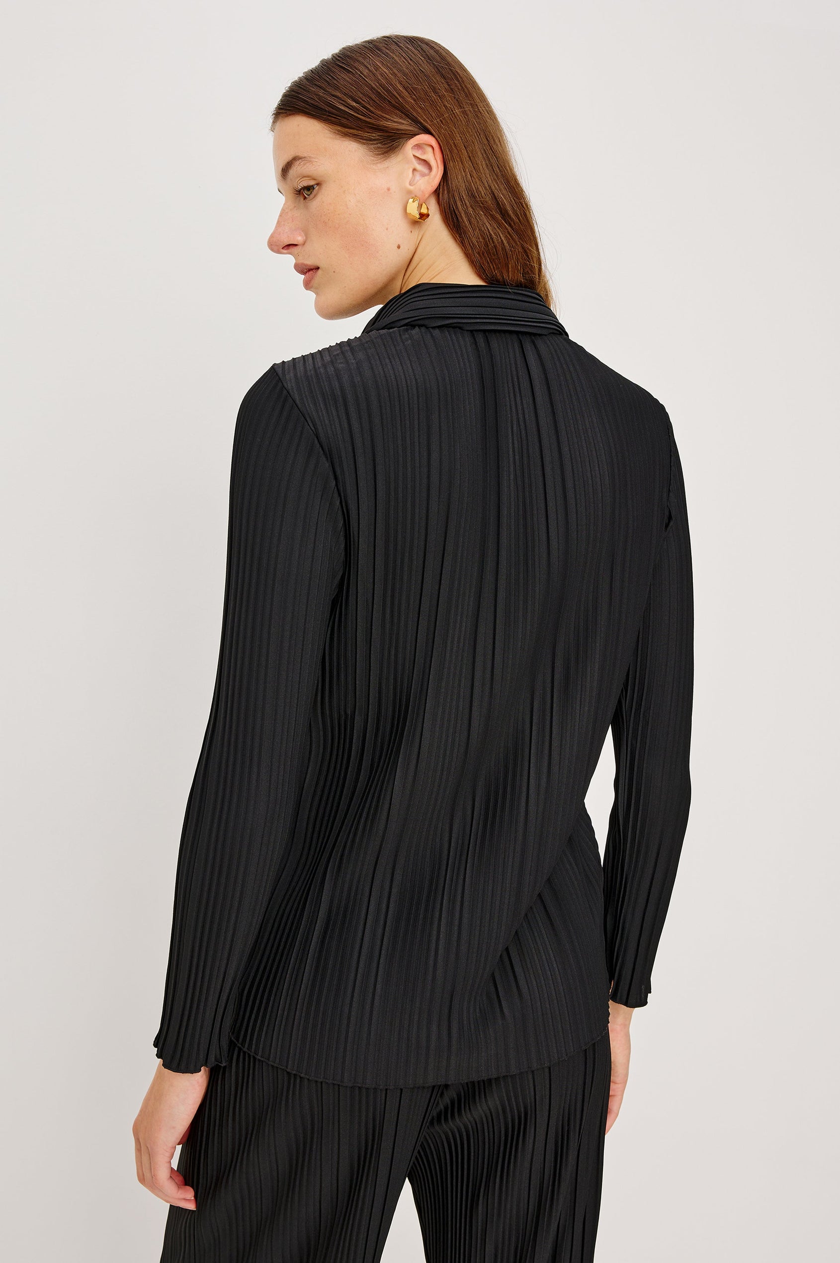 Raya Long Sleeve Button Up without Button Cuffs and with a Collar and Textured Fabric in Jet Colorway - Back View Featured on Model 