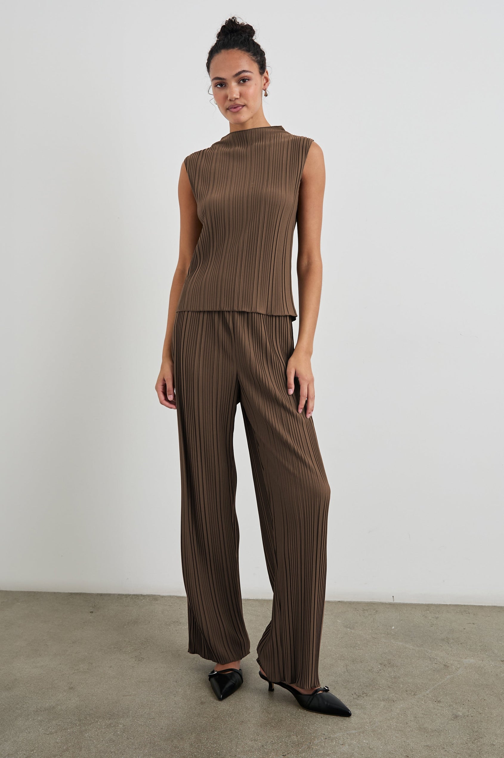 Liana Micro-Pleated Pants with an Elastic Waist in Morel Colorway - Front Full Body View Featured on Model 