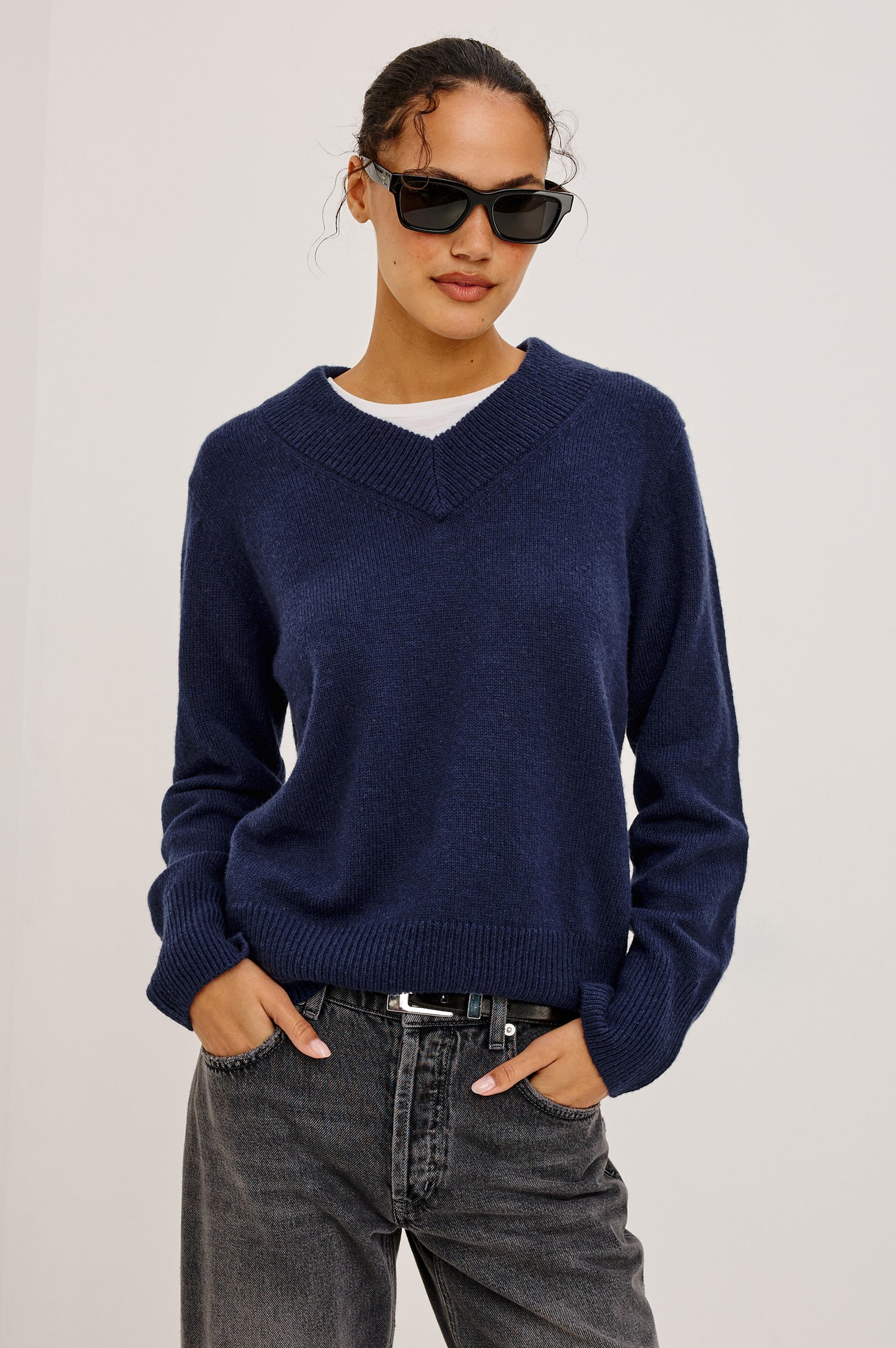 Lidya Sweater in Wool-Cashmere Knit Blend With V-Neckline, Loose Relaxed Fit, Long Sleeves, and Ribbed Trim in Navy Colorway - Upper Body Front View Featured on Model