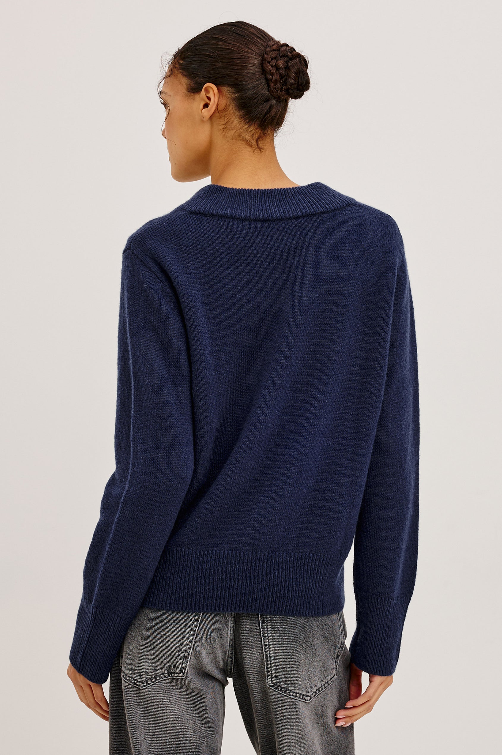 Lidya Sweater in Wool-Cashmere Knit Blend With V-Neckline, Loose Relaxed Fit, Long Sleeves, and Ribbed Trim in Navy Colorway - Upper Body Back View Featured on Model