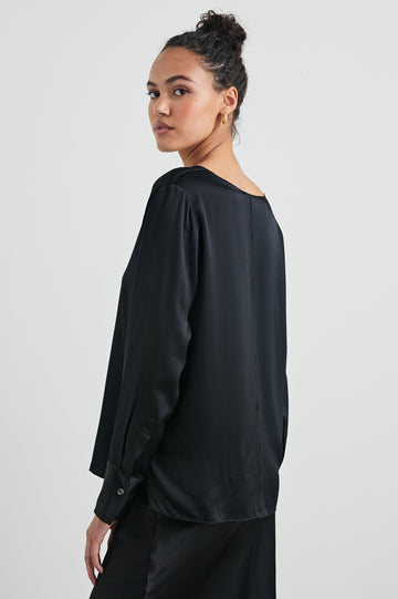 Liliana Long-Sleeve Top with a V Neck, Button Cuffs and a Vertical Seam Down the Front and Back in Black Colorway - Back View Featured on Model