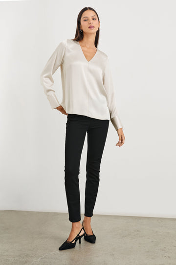 Liliana Long-Sleeve Top with a V Neck, Button Cuffs and a Vertical Seam Down the Front and Back in Ivory Colorway - Front Full Body View Featured on Model