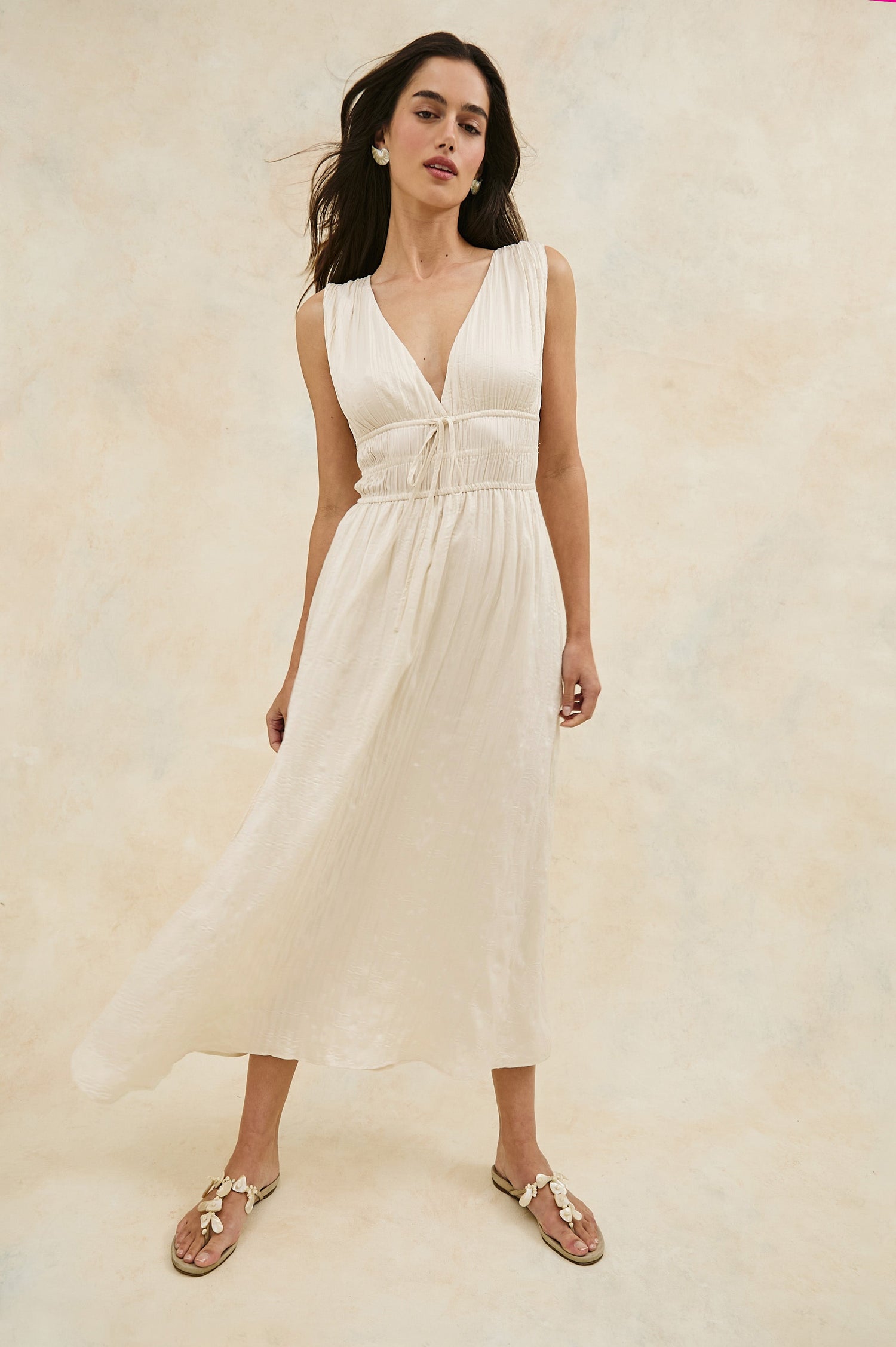 Lilith V-Neck Midi Dress with Drawstring at Under Bust and Gathering Detail at Shoulder Seam and Waist in Ivory Colorway. Full Body Front View Shown on Model.