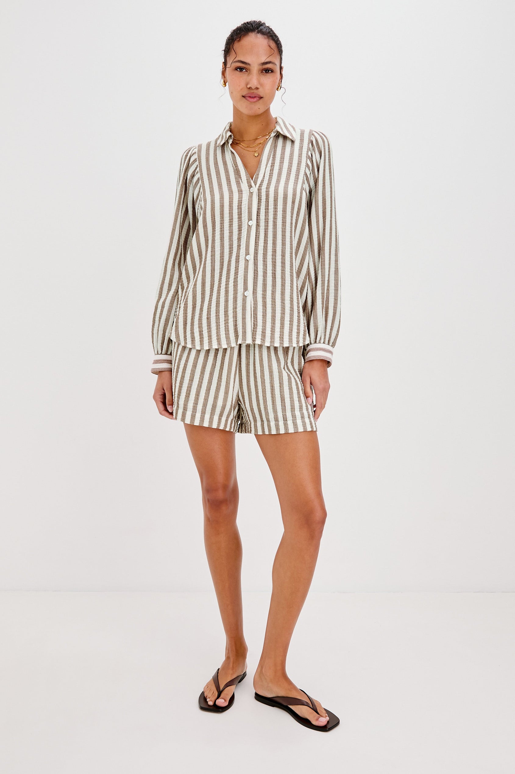 Lo V-Neck Collared Button Front Shirt with Long Sleeves in Brown and Cream Milos Stripe Colorway. Full Body Front View Shown on Model.