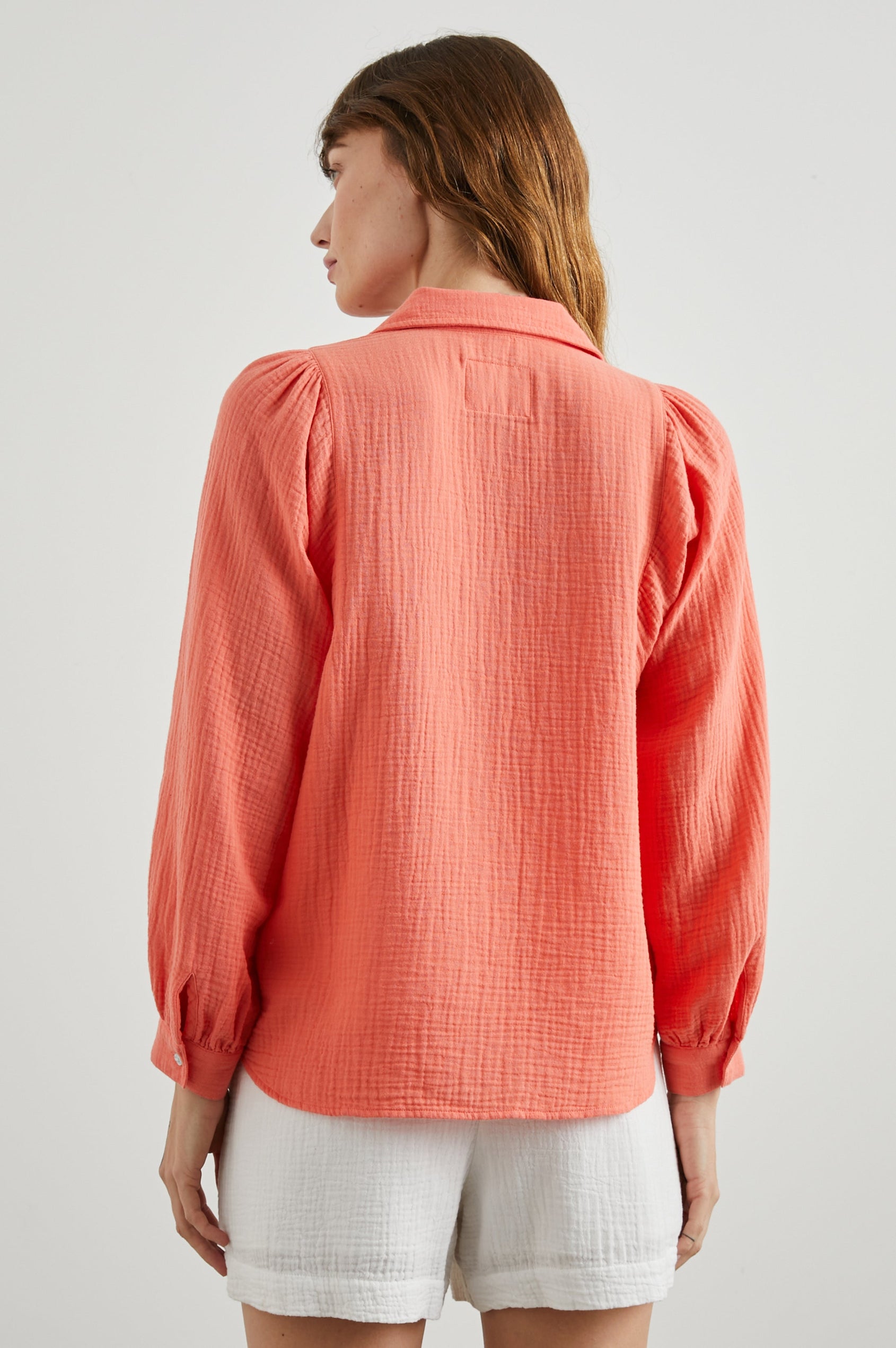 Lo Long-Sleeve Button Up with a V Neck in Papaya Colorway - Back View Featured on Model