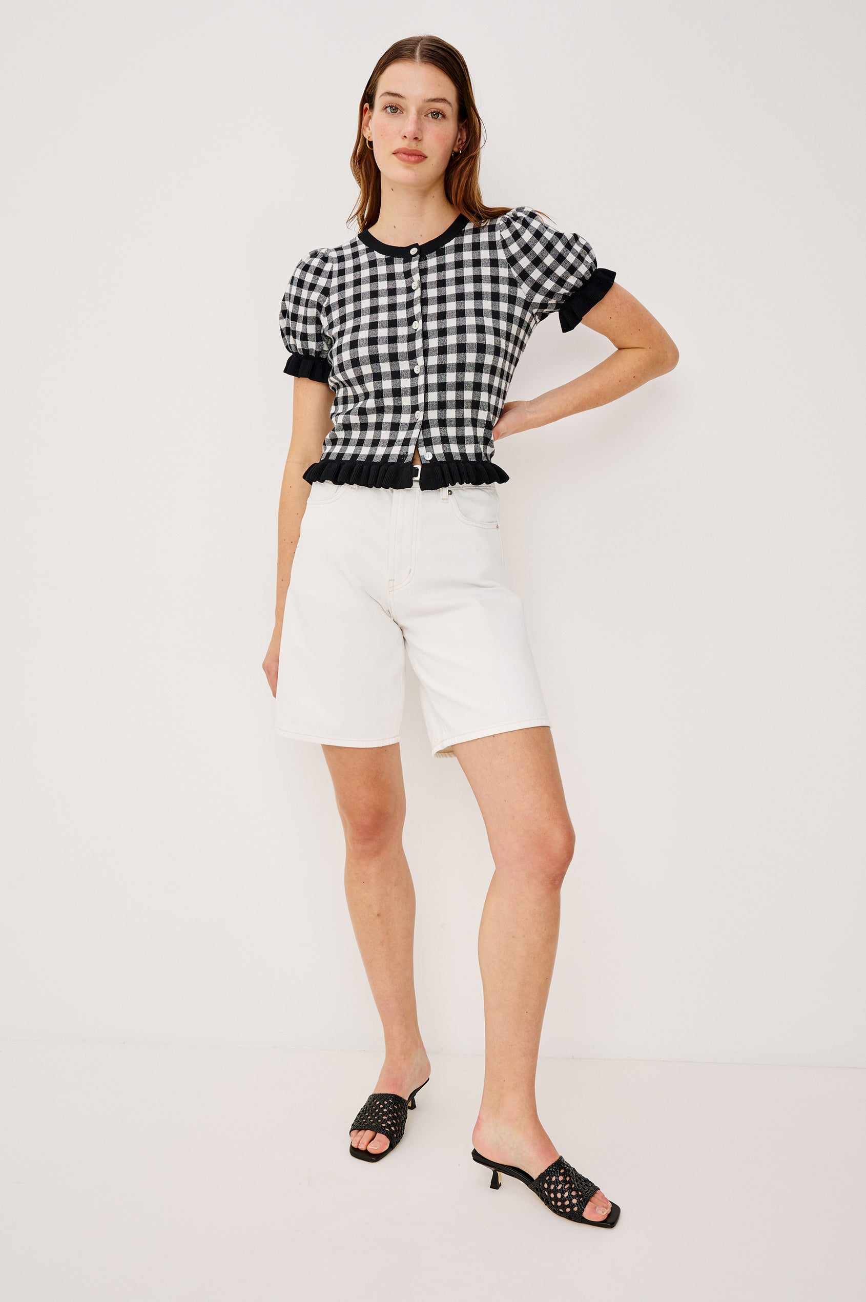 Lora Top in Wool Blend With Front Buttons Short Puff Sleeves Ruffle Trim and Classic Fit in Black White Gingham Colorway - Upper Body Front View Featured on Model