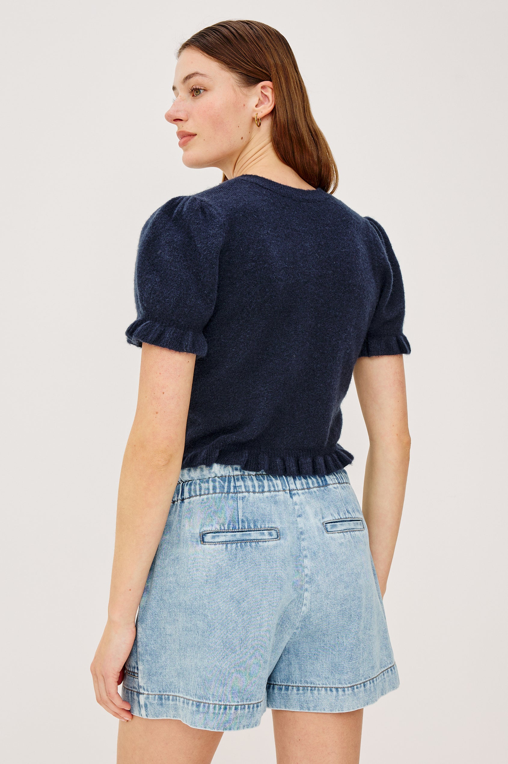 Lora Top in Wool Blend With Front Buttons, Short Puff Sleeves, Ruffle Trim, and Classic Fit in Navy Colorway - Upper Body Back View Featured on Model