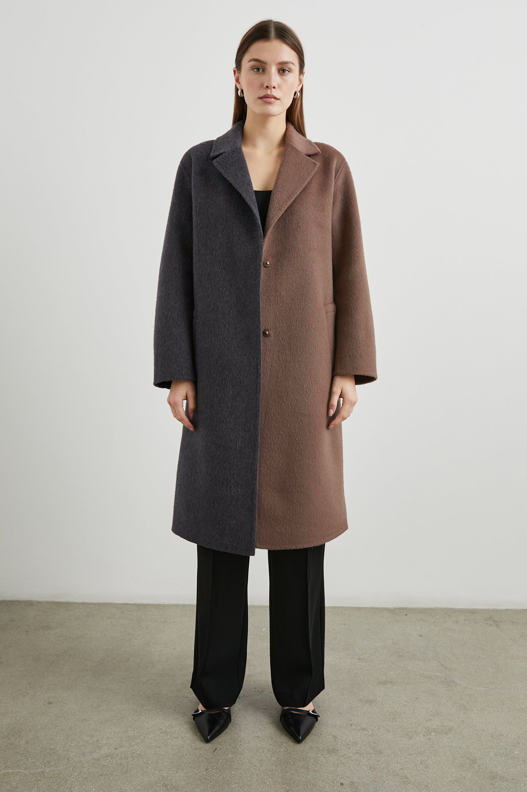 Lore Knee-Length Coat with Two Button Closure, Notched Lapels and Two Front Pockets in Charcoal Mink Mix Colorway, Left Half of Jacket is Mink and the Right Half is Charcoal  - Front Full Body View Featured on Model