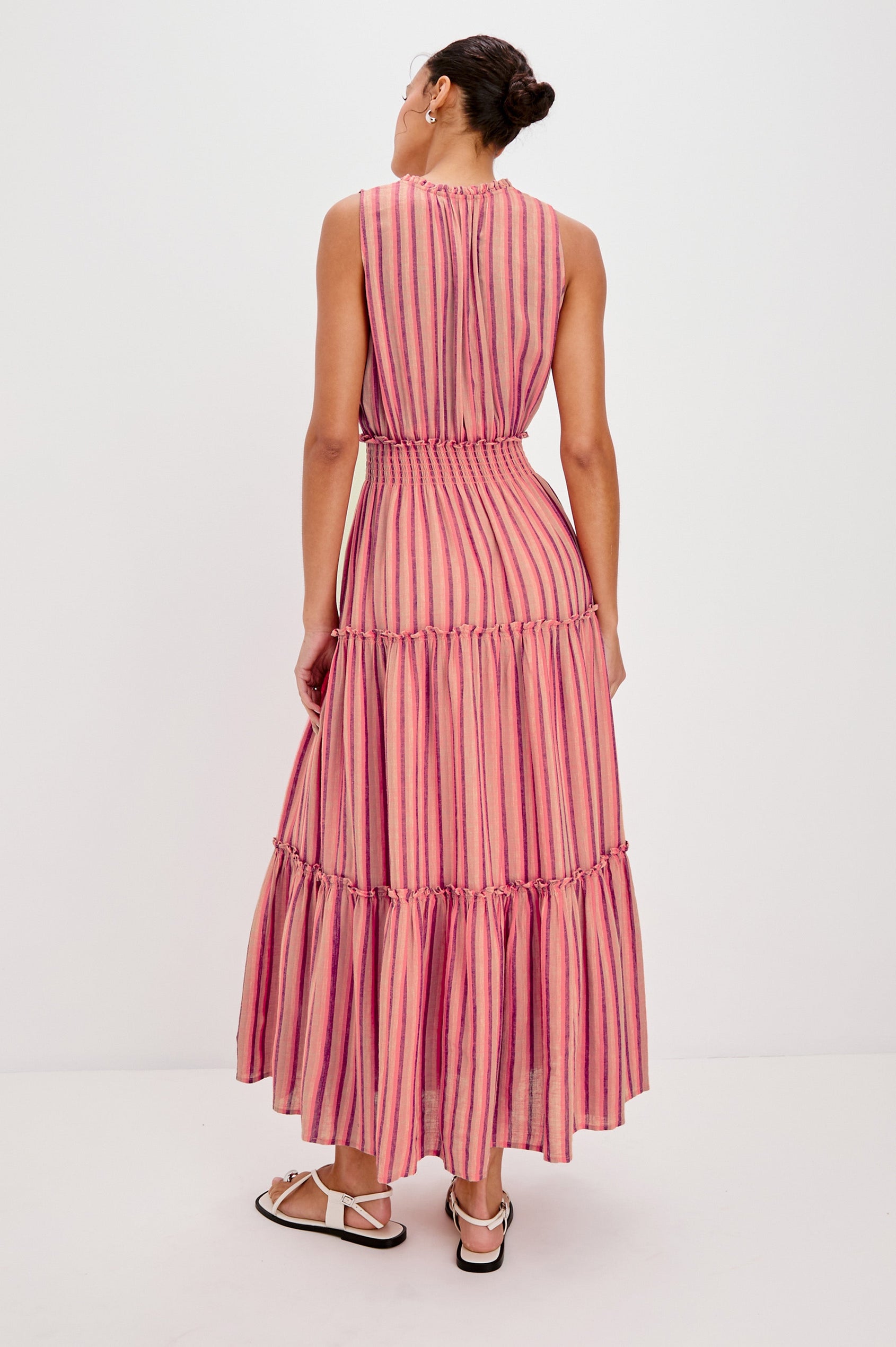 Loulou V-Neck Midi Dress with Smocked Elastic Waistband and a Multi Tiered Skirt in Cabana Stripe Colorway. Full Body Back View Shown on Model.