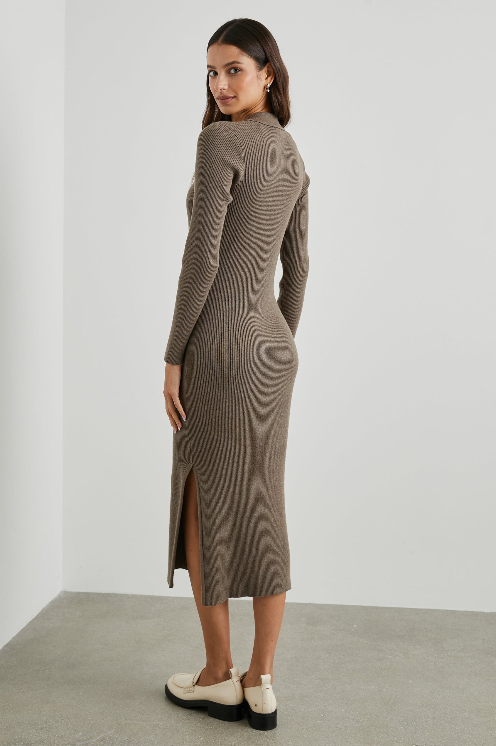 Luciana Ribbed, Long Sleeve Midi Dress with a V Neck Placket with a Collar, and a Side Slit in Latte Colorway - Back Full Body View Featured on Model 