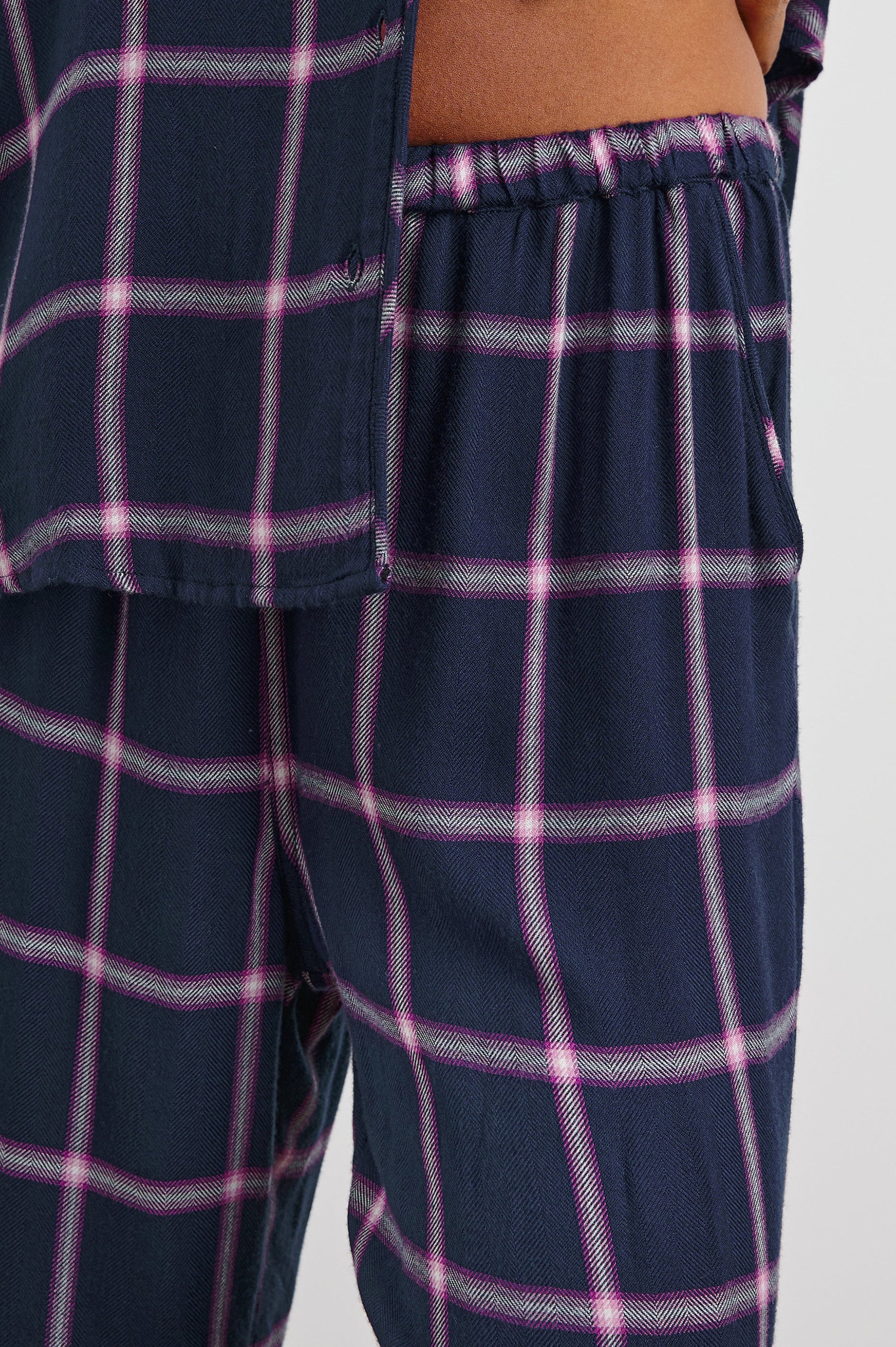 Luna Pajama Set with a Long Sleeve, Button Up, V Neck Top with a Chest Patch Pocket and Pants with Two Front Pockets in Sapphire Magenta Colorway, a plaid - Front View Featured on Model  