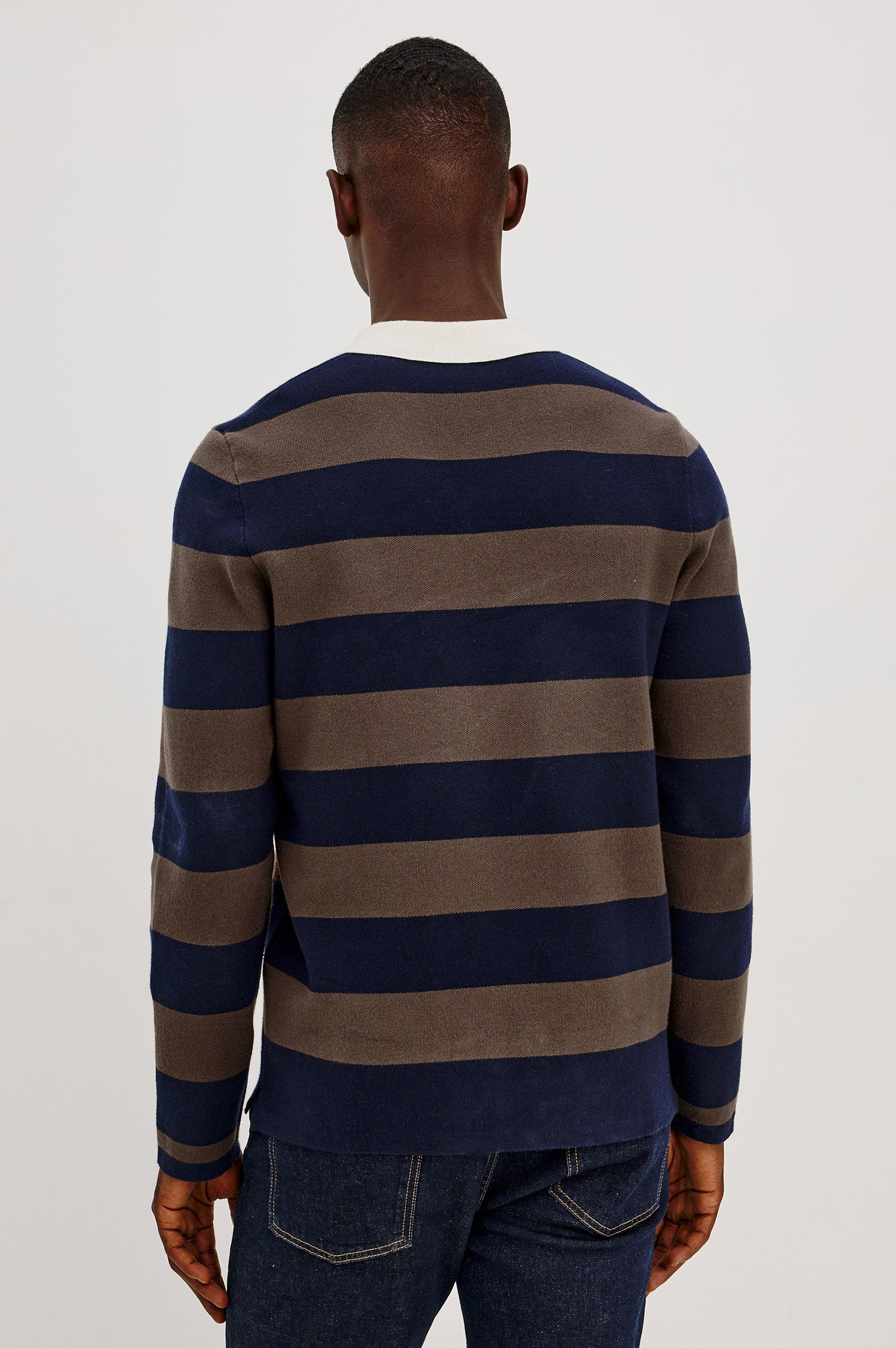 Luther Rugby Sweater in Cotton Knit With Contrast Polo Collar, Quarter-Button Placket, Relaxed Fit, and Long Sleeves in Navy Carob Stripe Colorway - Upper Body Back View Featured on Model