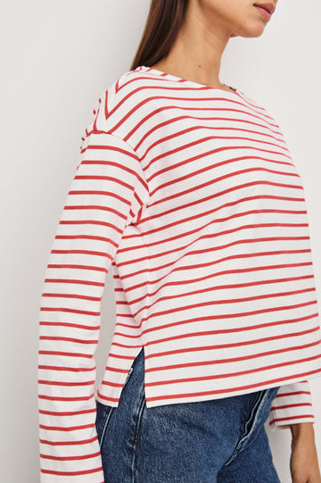 Macy Long-Sleeved Top with Boatneck and Two Short Side Slits at the Hem in Cherry Stripe Colorway, Cherry and White Horizontal Stripes - Side View Featured on Model