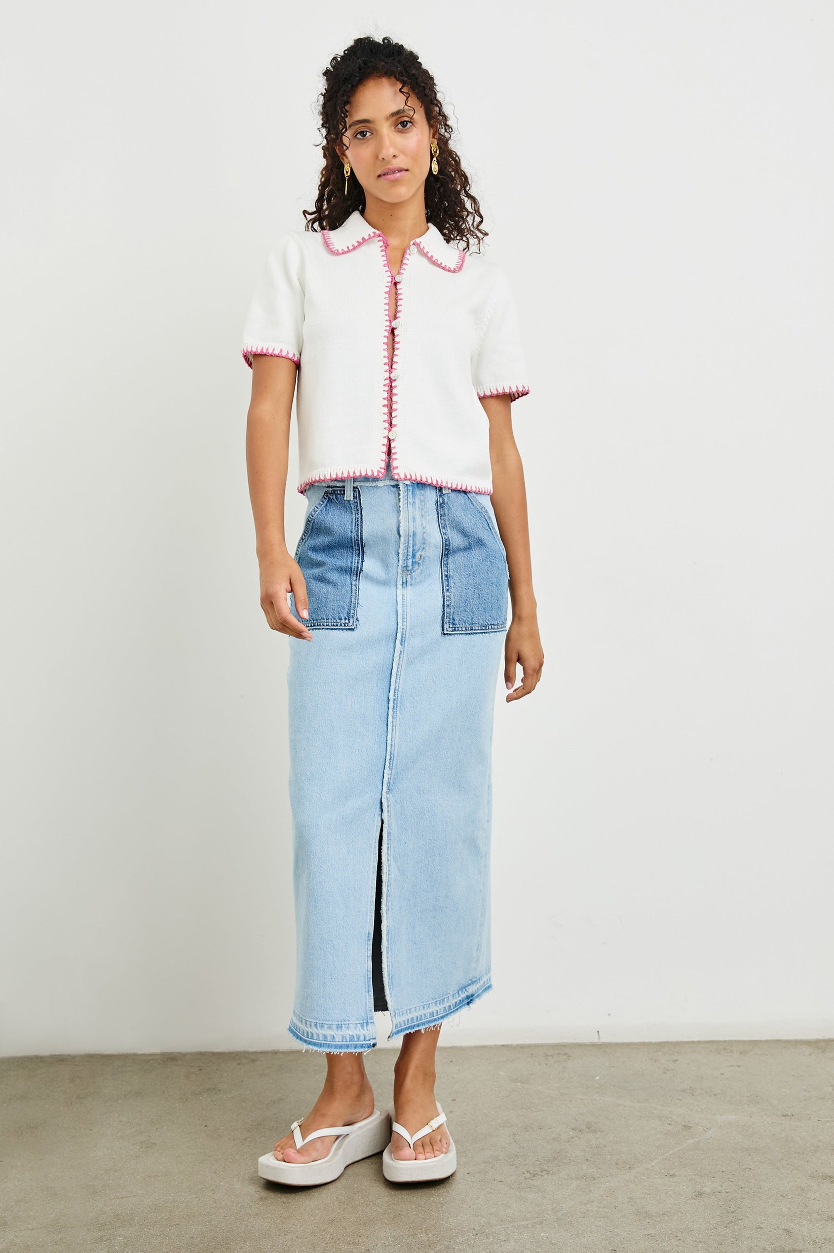 Maliah Short Sleeve Top with a Collar, Buttons Down the Front, and contrasting Blanket Stitches along the trim in Ivory Hibiscus Colorway with Hibiscus trim - Front Full Body View Featured on Model