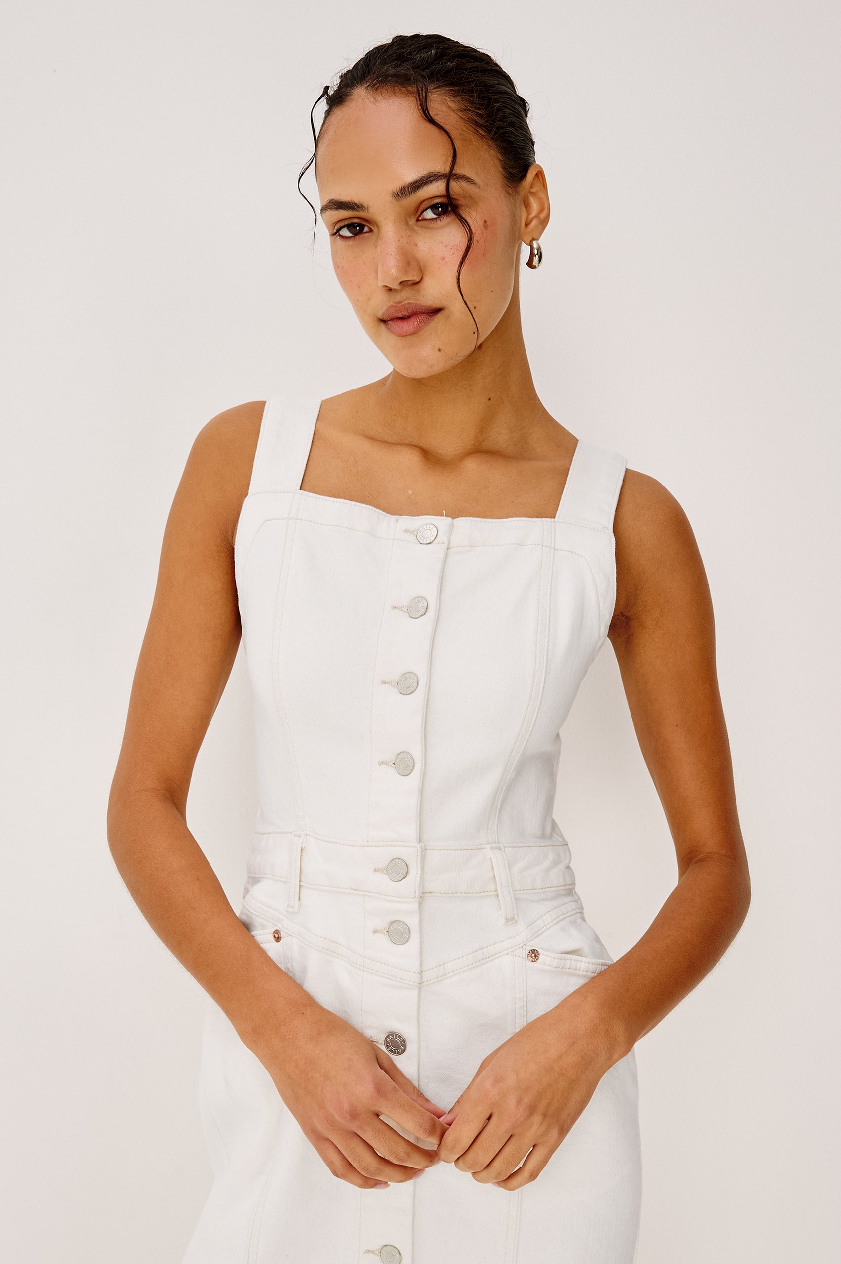 Malibu Sleeveless Denim Midi Dress with Shoulder Straps, Buttons Down the Front, a Square Neckline in the Front and Back, Two Front Pockets and Two Back Patch Pockets in Vintage Ecru Colorway - Front Full Body View Featured on Model