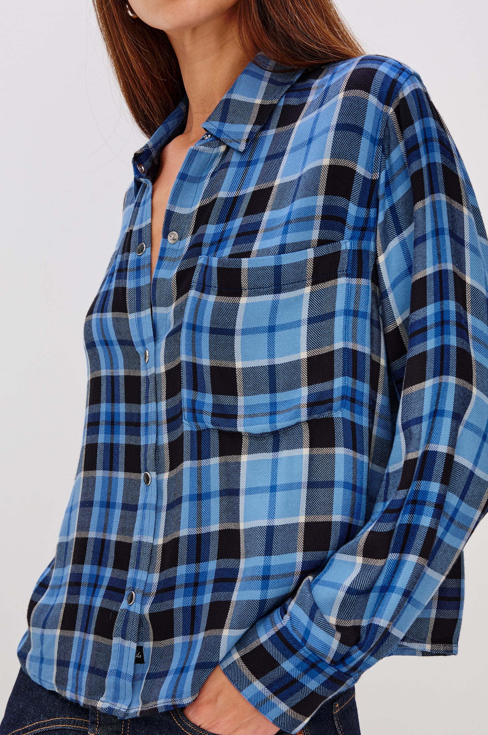 Malin Cropped Long-Sleeve Button Up with a Chest Patch Pocket in Midnight Blue White Colorway, plaid - Close Up View Featured on Model