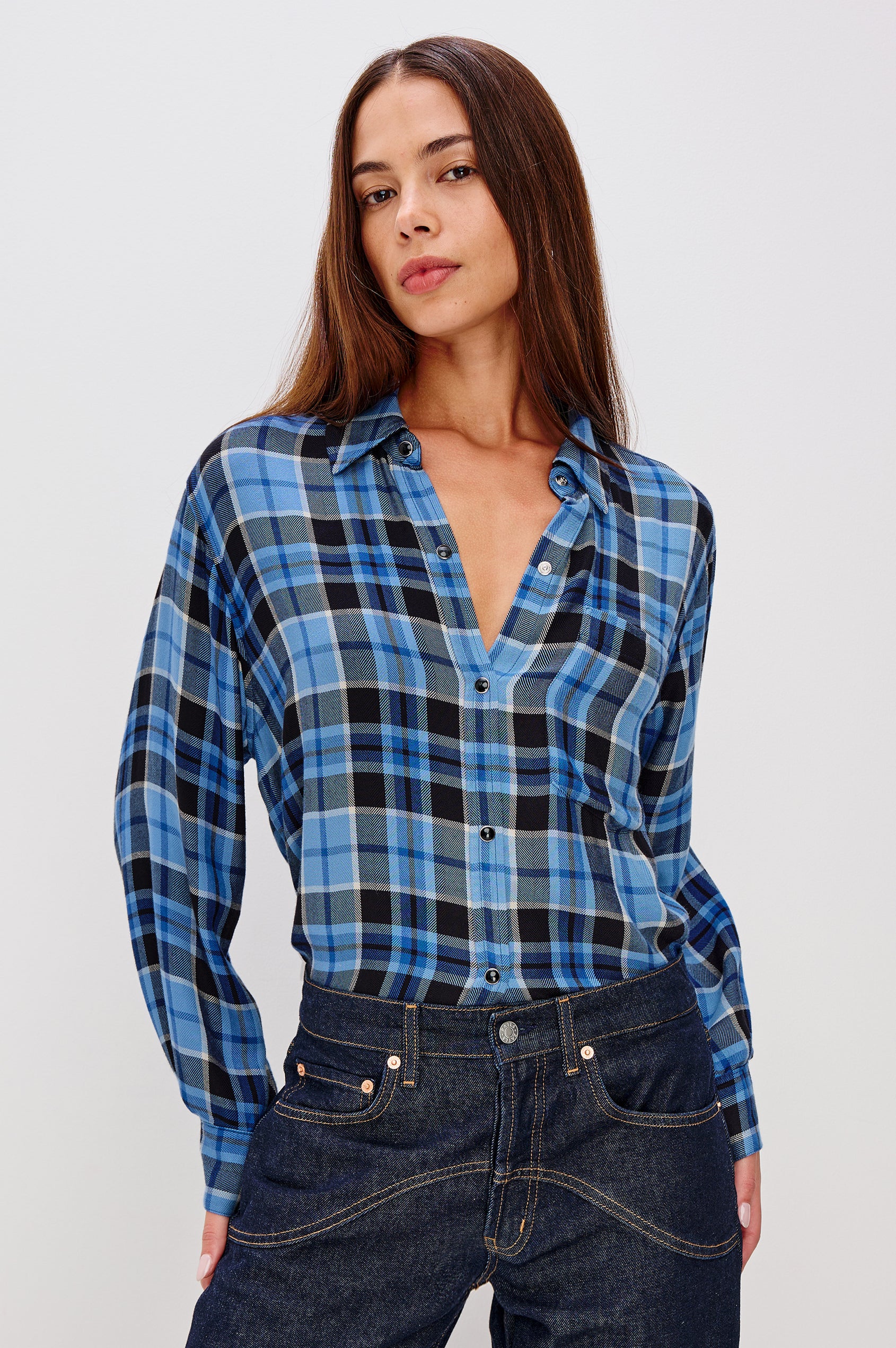 Malin Cropped Long-Sleeve Button Up with a Chest Patch Pocket in Midnight Blue White Colorway, plaid - Front View Featured on Model