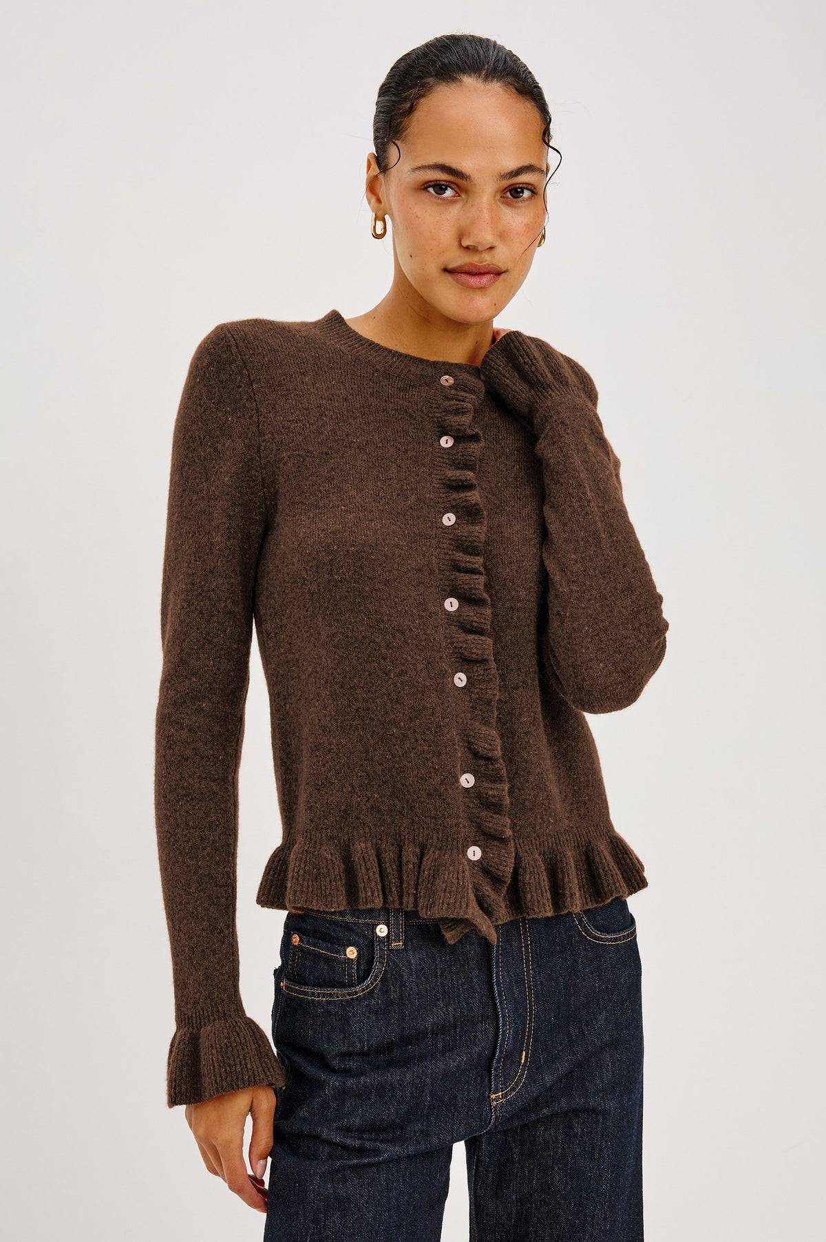Mandy Sweater in Cashmere-Cotton-Wool Blend Knit Front Buttons, Long Sleeves, Classic Slightly Cropped Fit, and Ribbed Ruffle Trim in Heather Latte Colorway - Front Crop View Featured on Model.