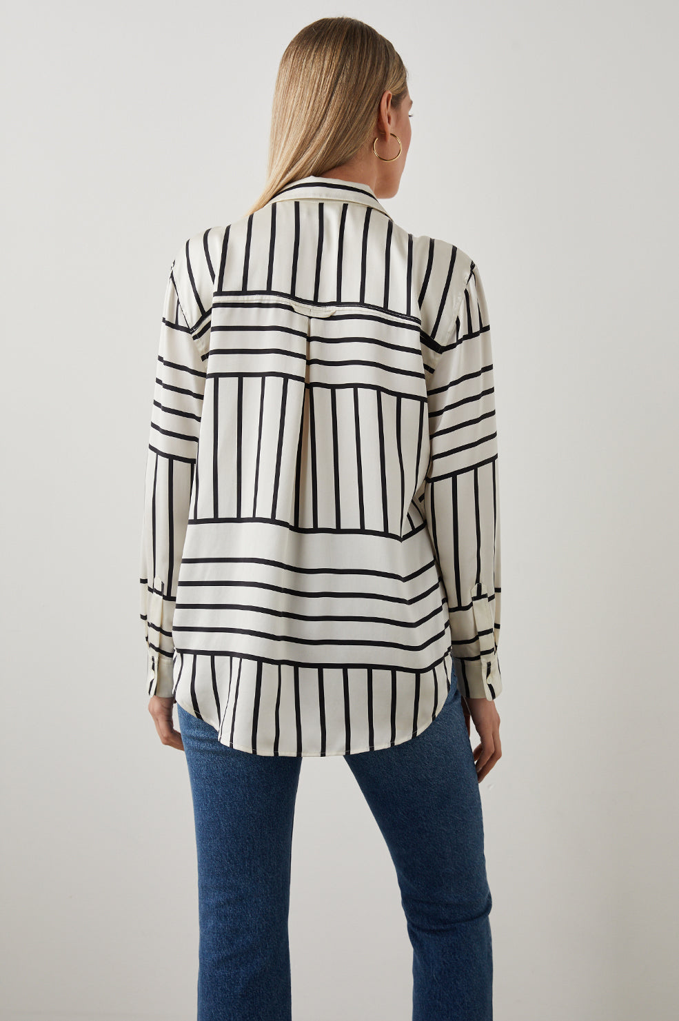 Mara Long-Sleeve Button Up with One Center Pleat Under the Back Yoke in Patchwork Stripe Colorway, Patches of Horizontal and Vertical Black Stripes on Cream - Back Full Body View Featured on Model 