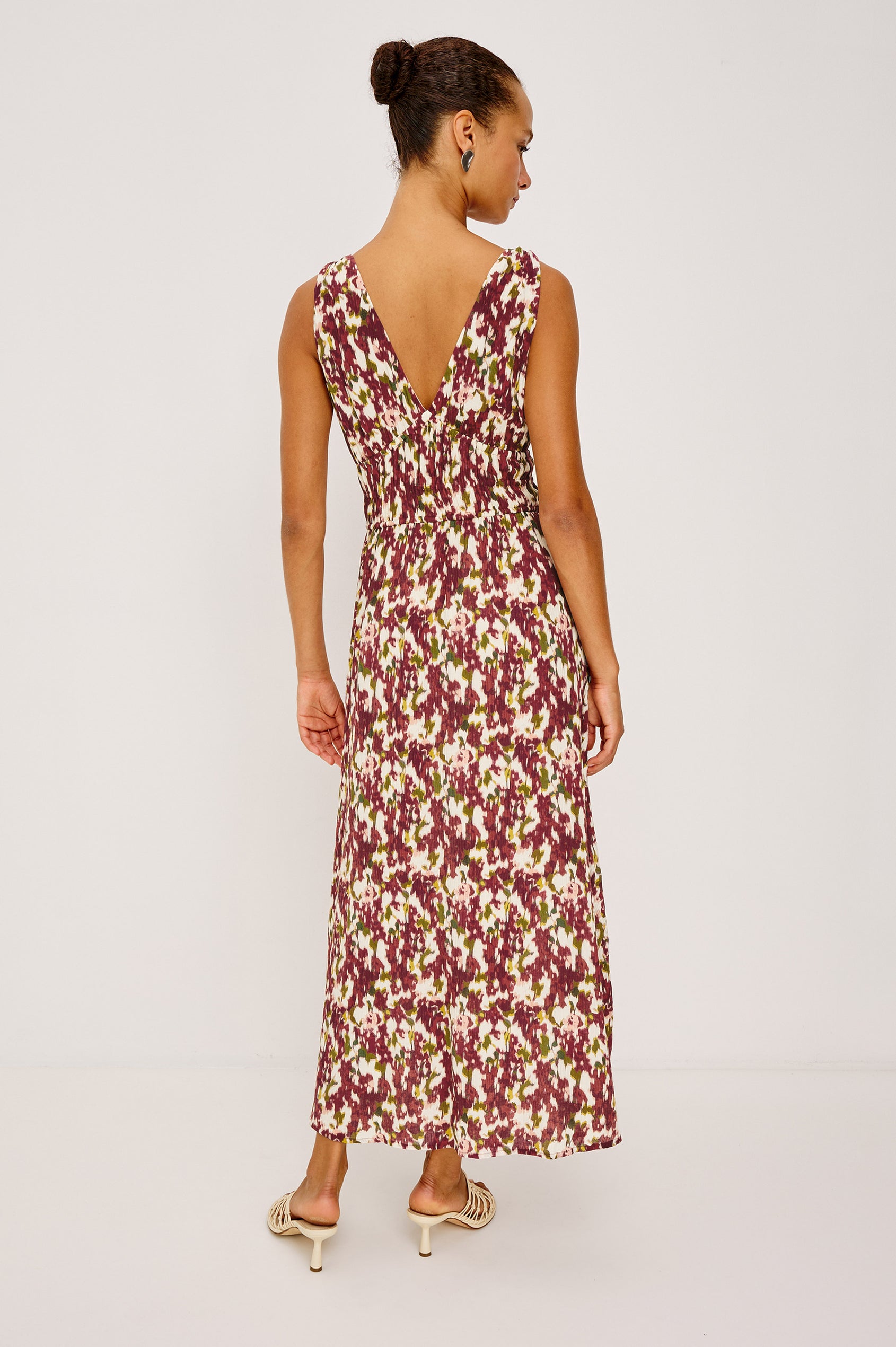 Marciana Midi Dress in Crinkle Chiffon With V-Neckline, Knotted Shoulder Straps, Smocked Waist, Adjustable Empire Waist Ties, and is Fully Lined in Cardinal Floral Colorway - Full Body Back View Featured on Model