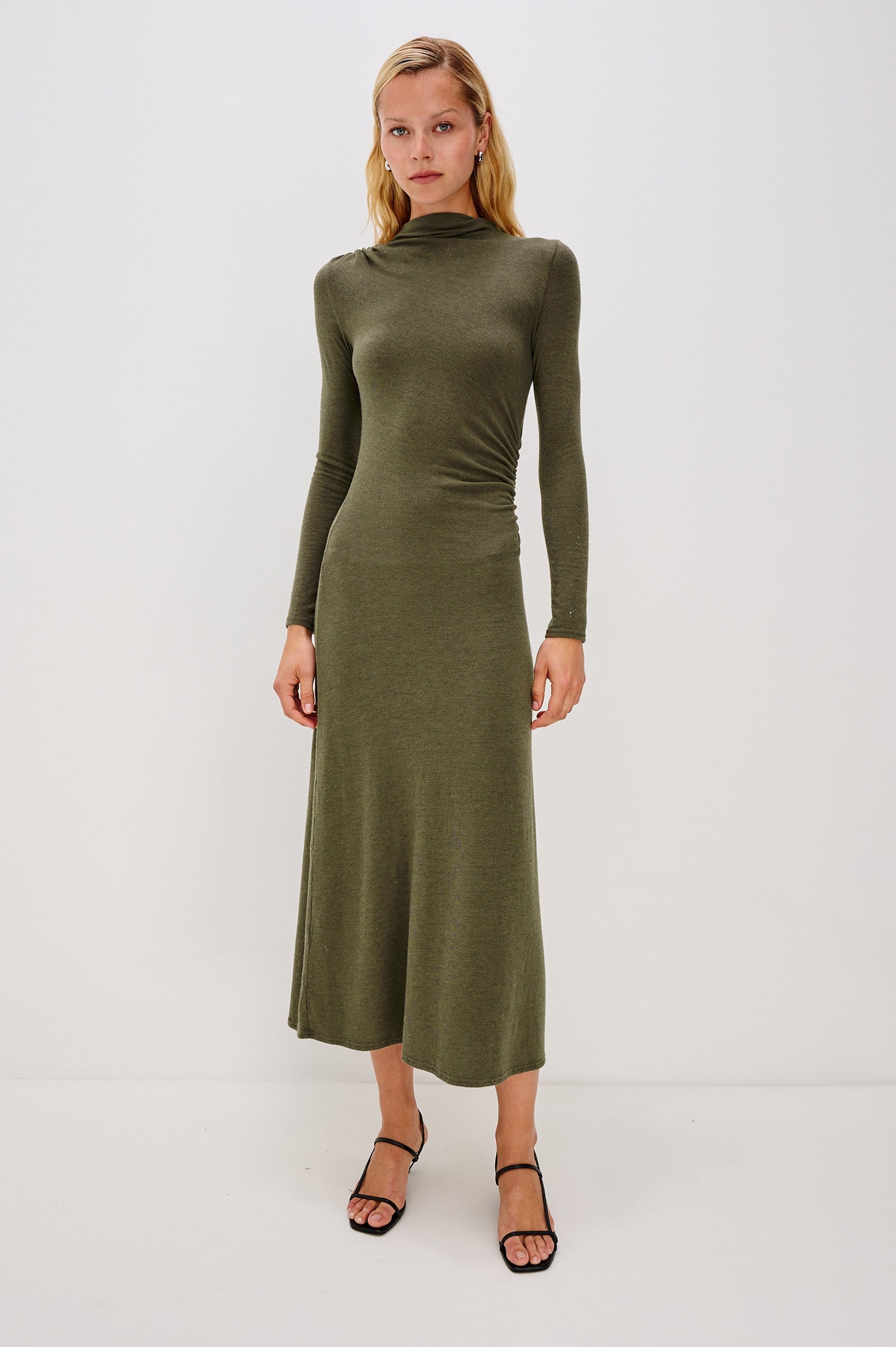Margaret Long-Sleeve Midi Dress with a Mock Neck and Shirring along the Left Side in Heather Olive Colorway - Full Body Front View Featured on Model