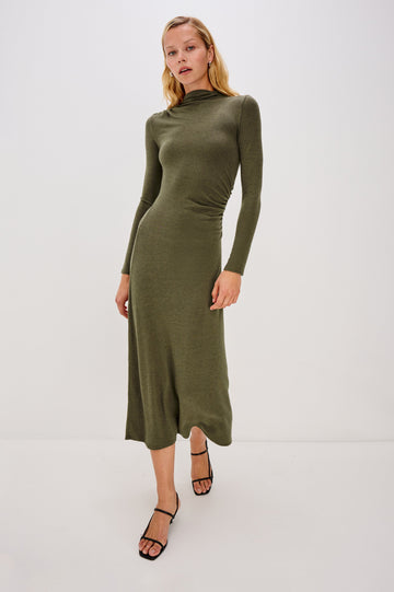 Margaret Long-Sleeve Midi Dress with a Mock Neck and Shirring along the Left Side in Heather Olive Colorway - Full Body Front View Featured on Model