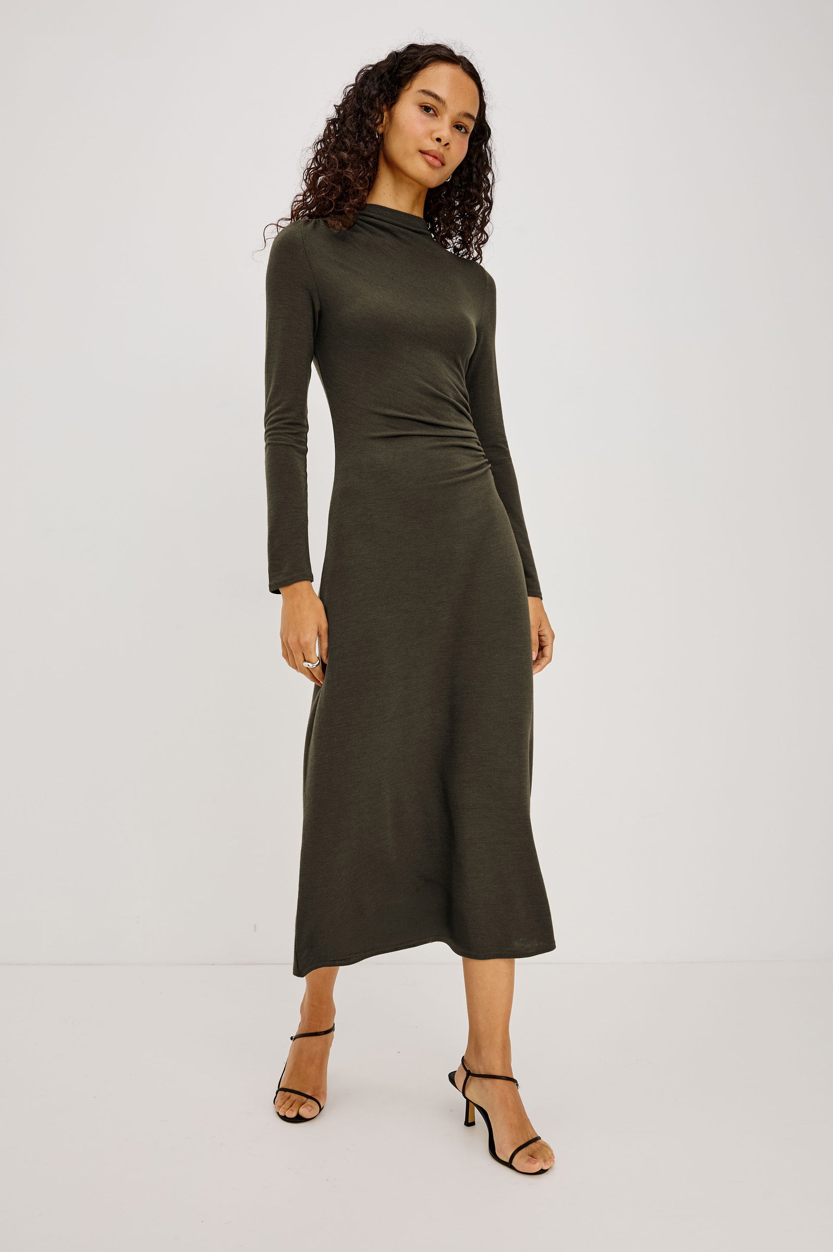 Margaret Midi Dress in Brushed Tissue Jersey With Mock Neck, Long Sleeves, Ruched Sides, and Fitted Silhouette in Heather Olive Colorway - Full Body Front View Featured on Model