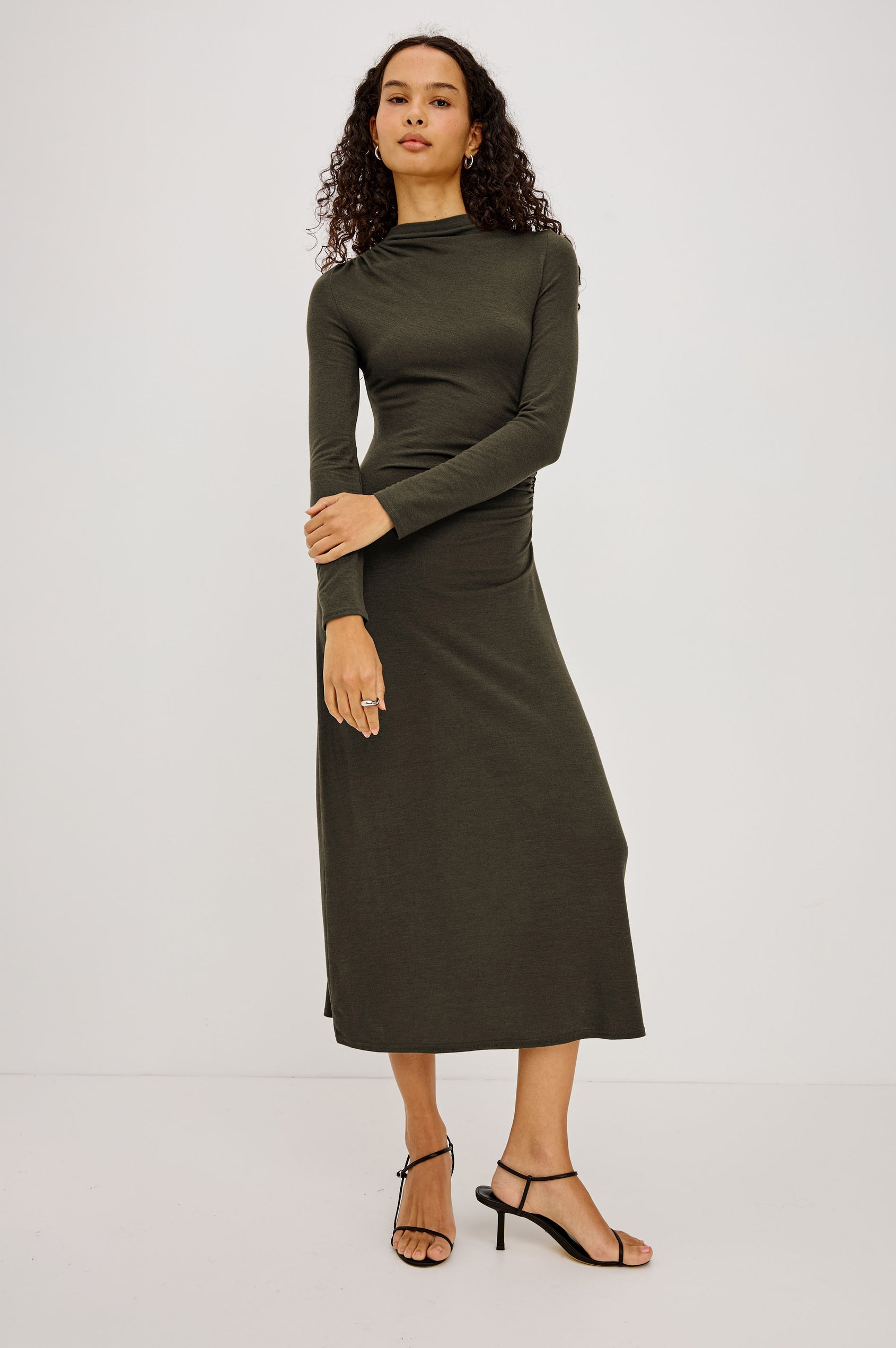 Margaret Midi Dress in Brushed Tissue Jersey With Mock Neck, Long Sleeves, Ruched Sides, and Fitted Silhouette in Heather Olive Colorway - Full Body Front View Featured on Model