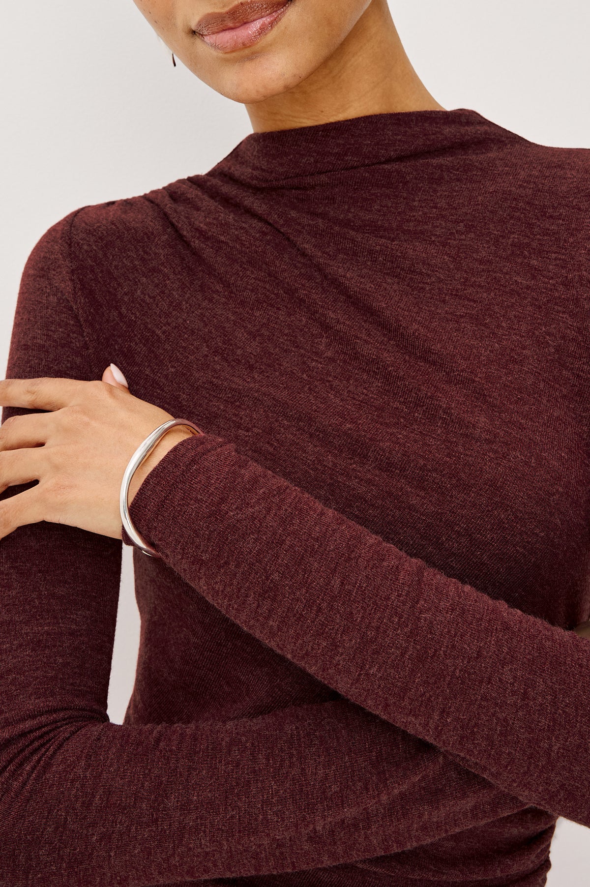 Margaret Midi Dress in Brushed Tissue Jersey With Mock Neck, Long Sleeves, Ruched Sides, and Fitted Silhouette in Merlot Colorway - Upper Body Front View Featured on Model