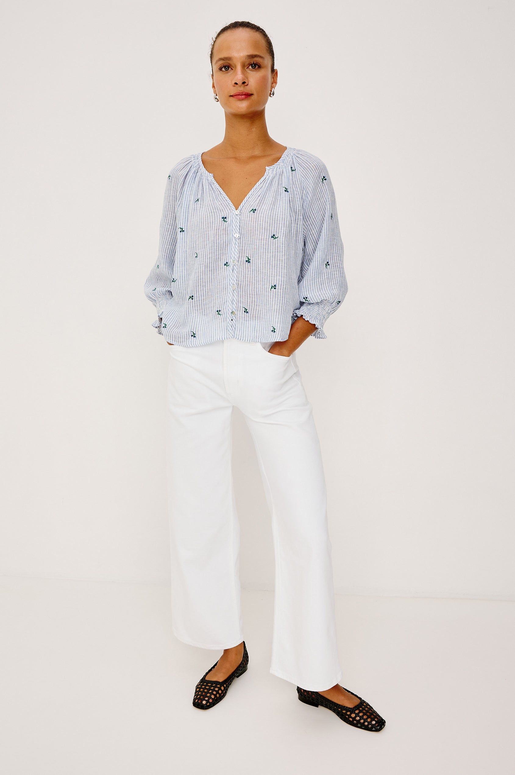 Mariah Peasant Style Bouse Top in Beach Cotton With Split V-Neck Collar, Front Buttons, Smocked Cuffs, and Loose Fit in Bluebell Embroidered Stripe Colorway - Full Body Front View Featured on Model