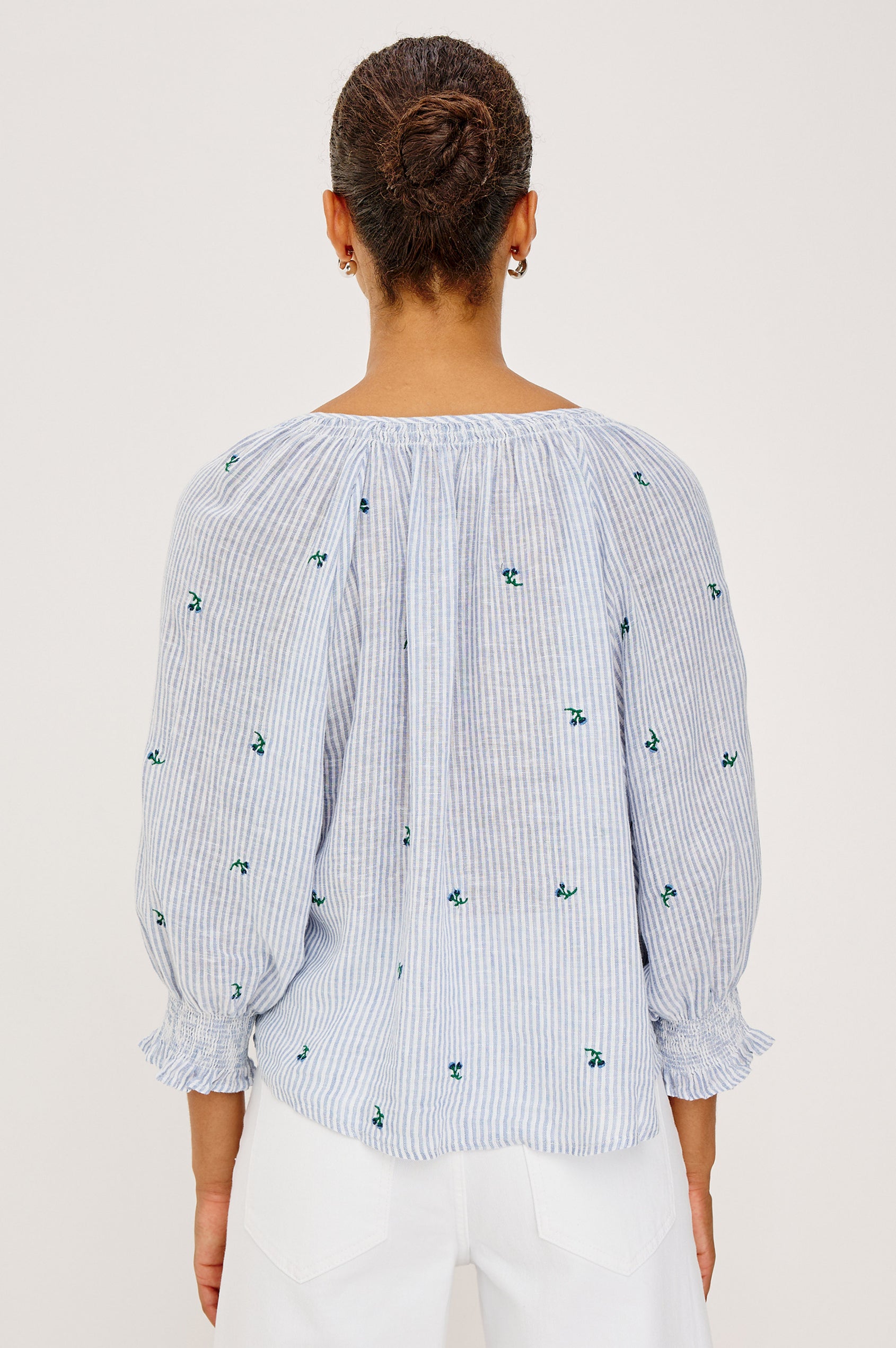 Mariah Peasant Style Bouse Top in Beach Cotton With Split V-Neck Collar, Front Buttons, Smocked Cuffs, and Loose Fit in Bluebell Embroidered Stripe Colorway - Full Body Front View Featured on Model