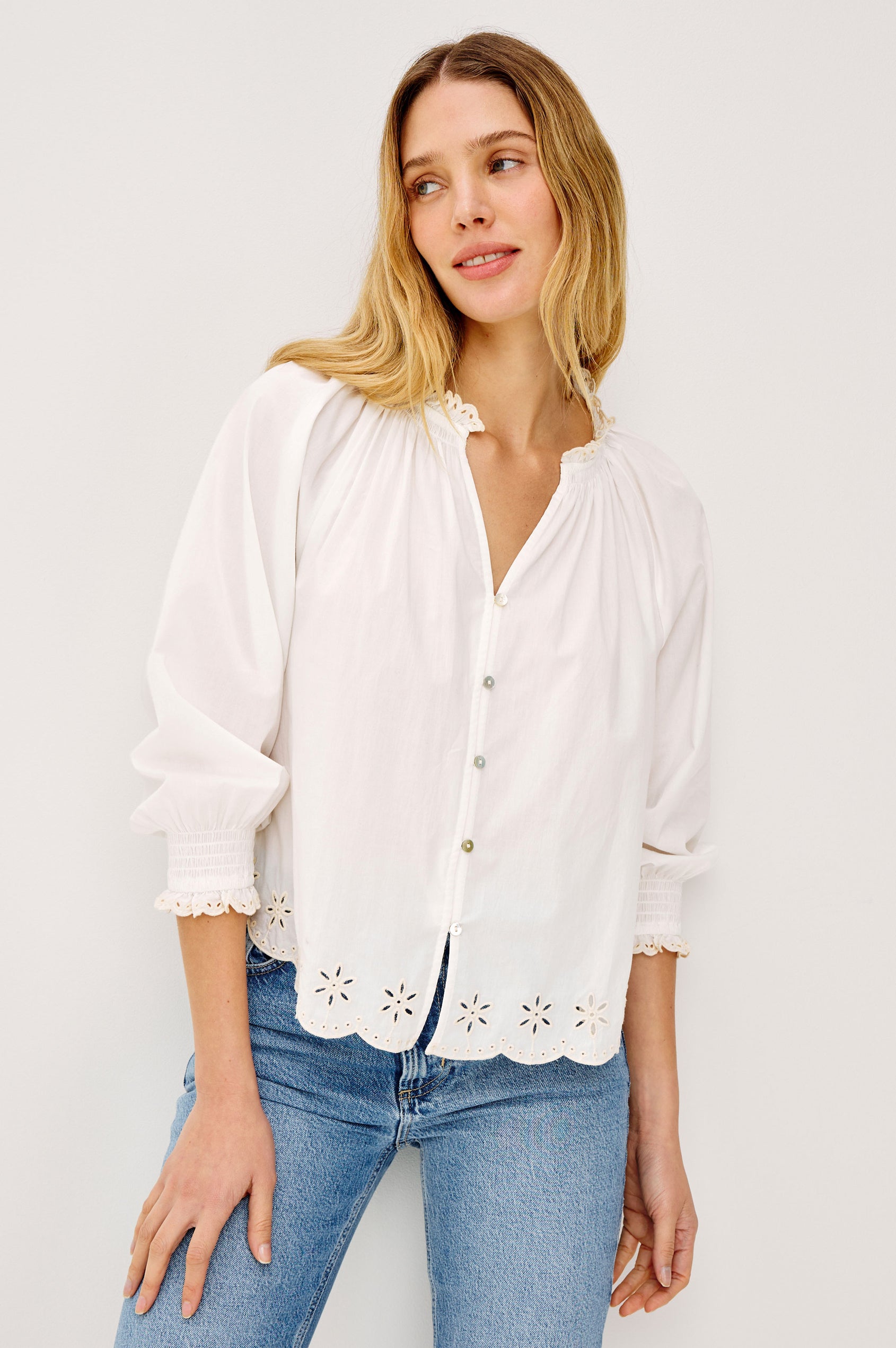 Mariah Peasant Style Bouse Top in Beach Cotton With Split V-Neck Collar, Front Buttons, Smocked Cuffs, and Loose Fit in Oat Embroidery - Upper Body Front View Featured on Model
