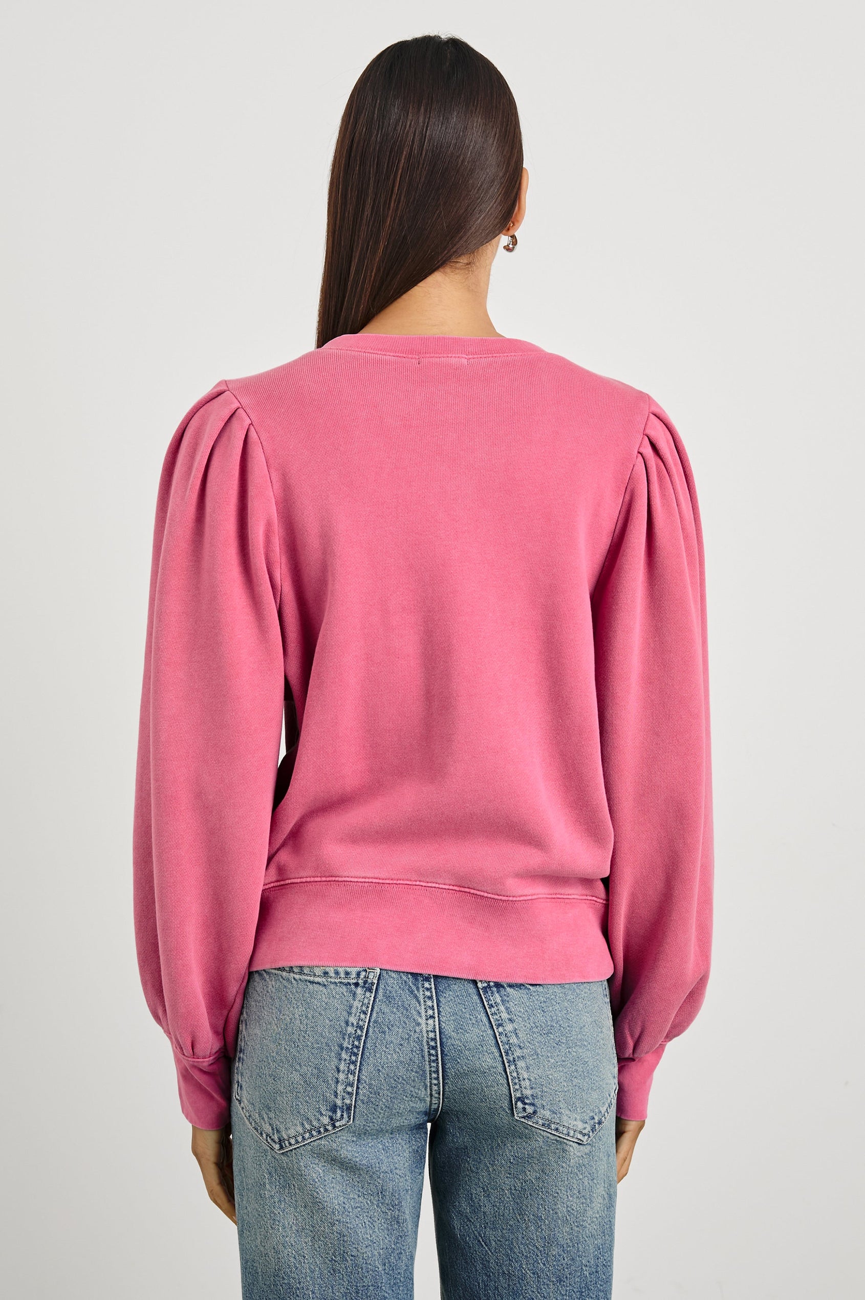 Mariana Long-Sleeve Sweatshirt with a Crew Neck with a Six-Button Placket and Light Ruching at the Cuffs and Sleeve Shoulder in Hibiscus Colorway - Back View Featured on Model 