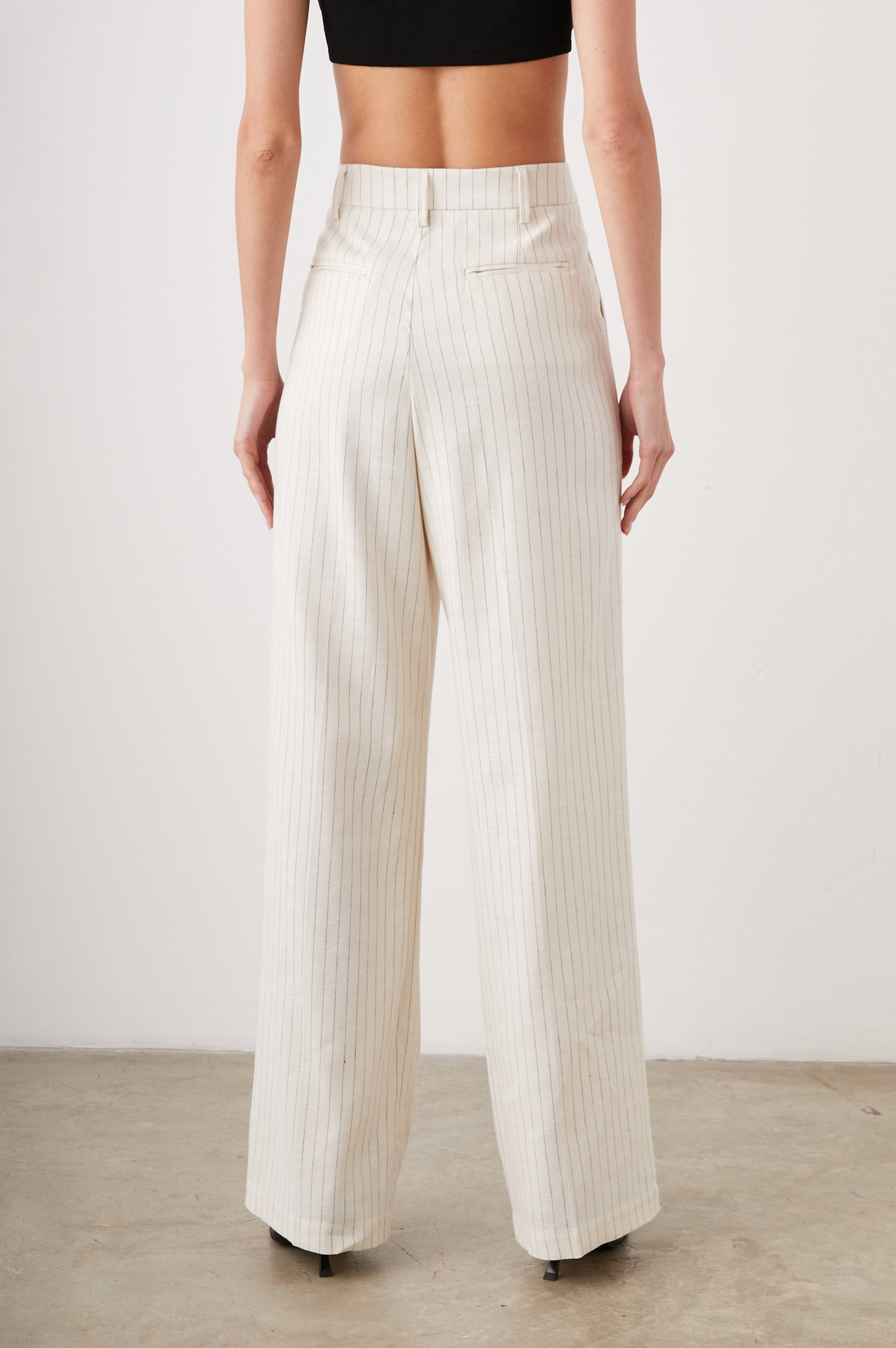 Marnie Pants with Concealed Closure, Belt Loops, Two Front Pockets and Two Back Welt Pockets in Ivory Pinstripe Colorway- Back View Featured on Model 