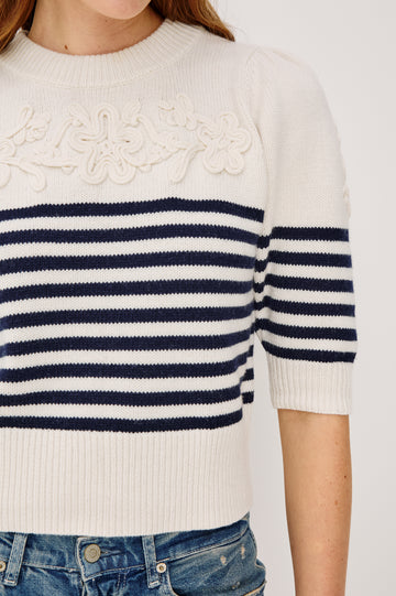 Martha Top in Wool Blend With Crew Neckline, Soutached Floral Detailing, Elbow-Length Puff Sleeves, and Ribbed Trim in Navy Floral Stripe Colorway - Upper Body Close Up View Featured on Model