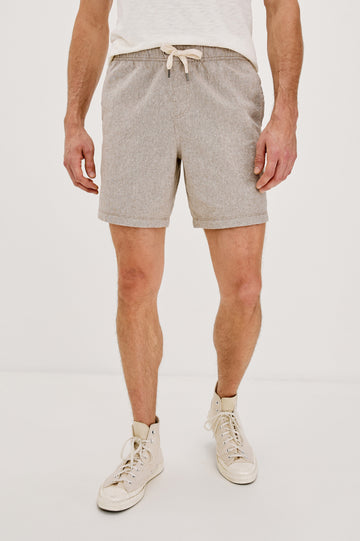 Martin Pull on Short with a an Elastic and Drawstring Waist and Side Pockets in Bulgur Oat Colorway. Front View Shown on Model.