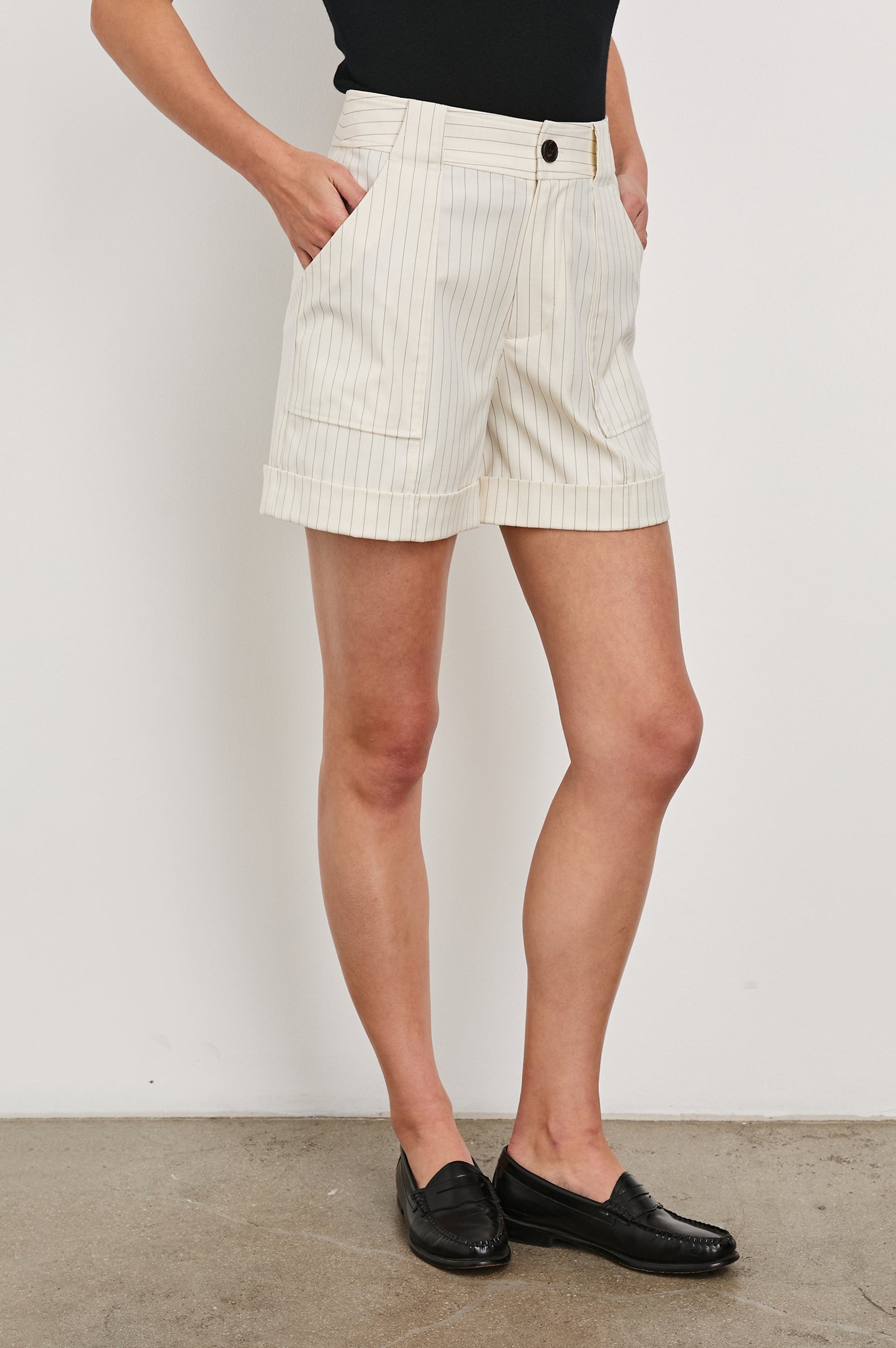 Maryam shorts with Cuffed Hems, Two Large Front Pockets, Two Back Patch Pockets, and Belt Loops in Birch Pinstripe Colorway, vertical stripes in grey and cream - Front View Featured on Model